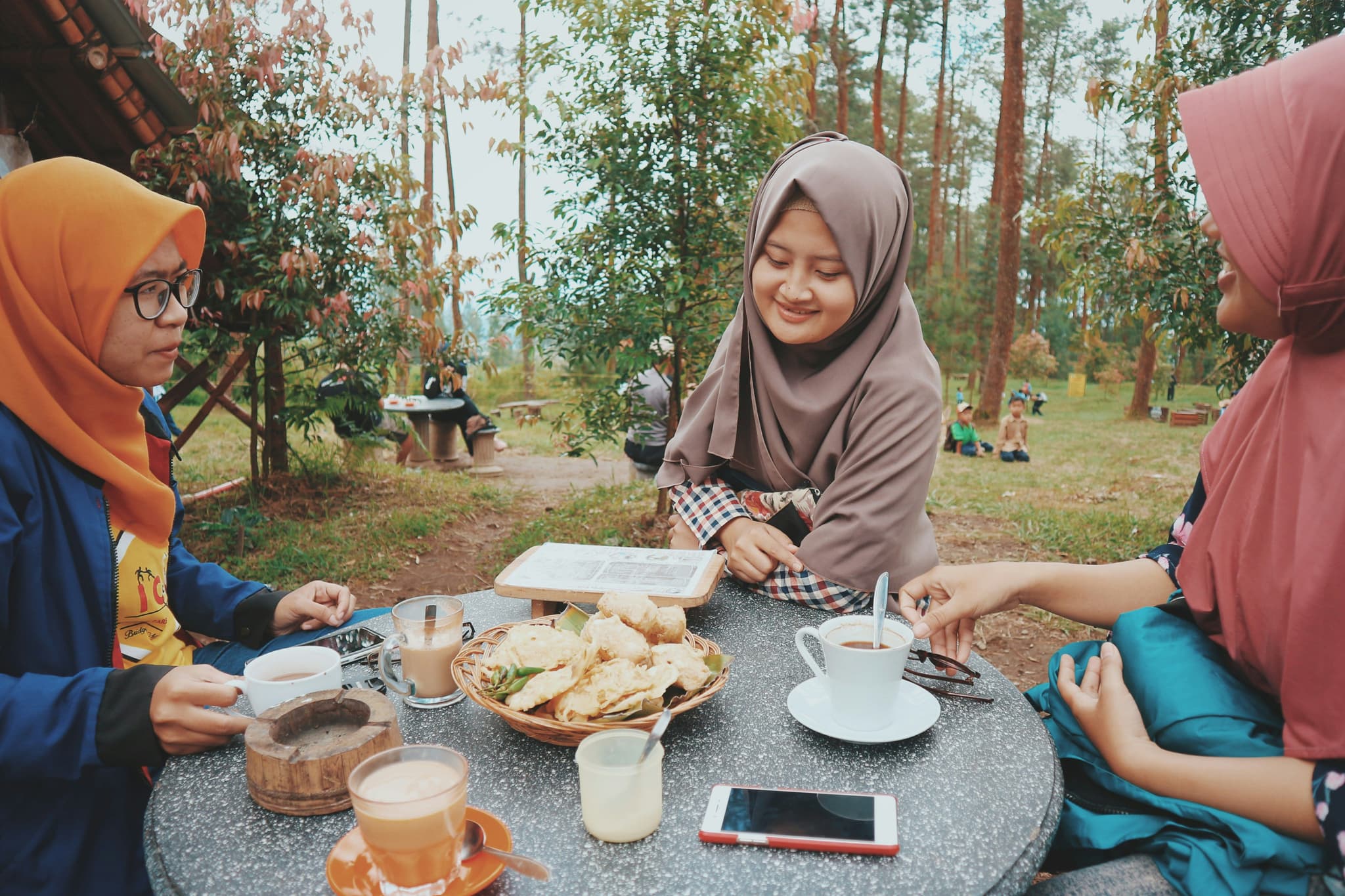 Family gathered on a table for Eid al-Fitr celebration