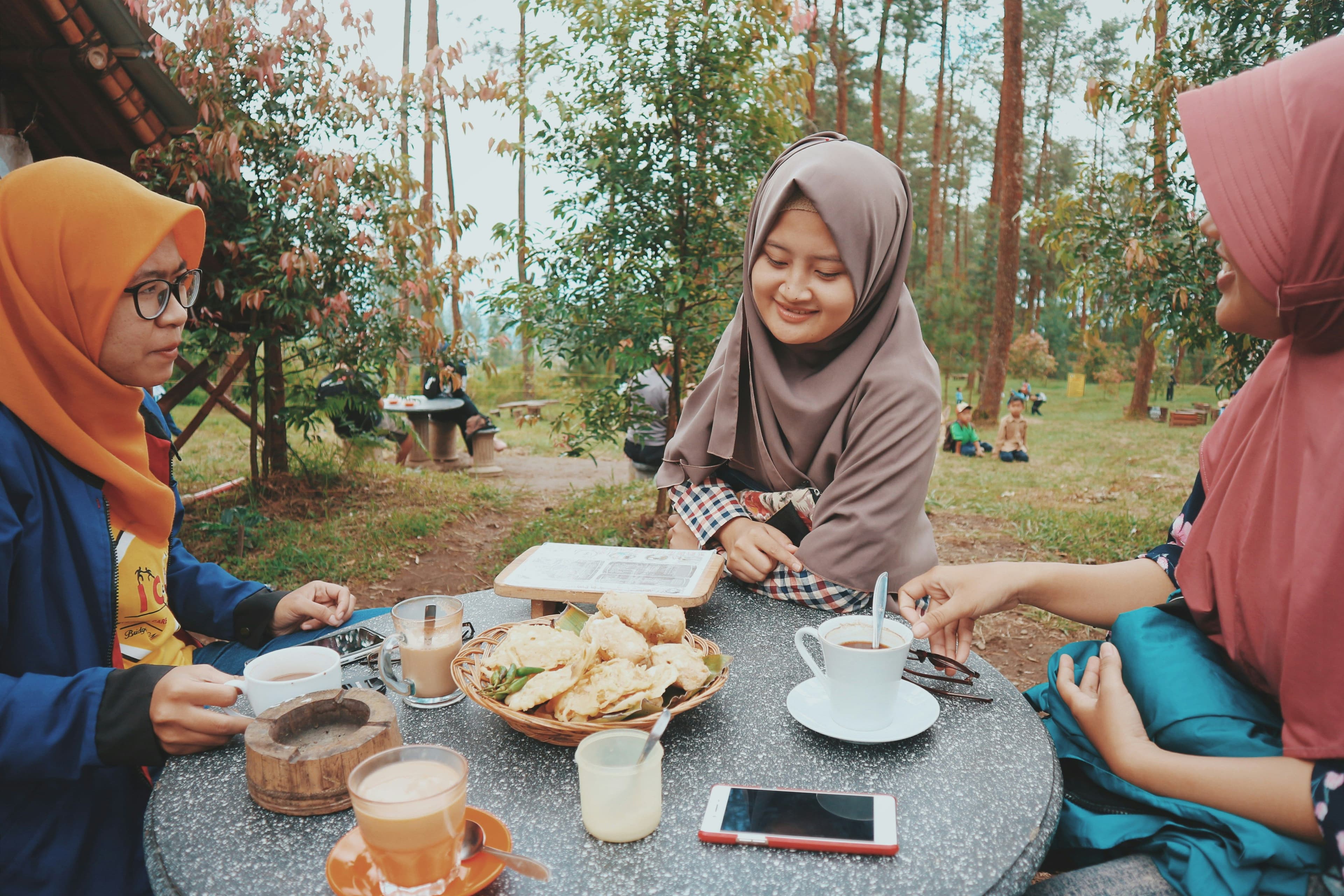 Family gathered on a table for Eid al-Fitr celebration