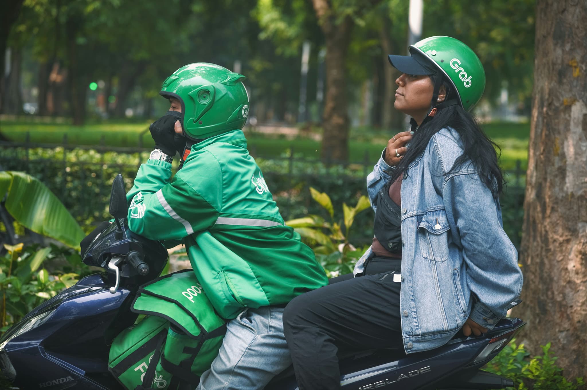 Grab taxi motorbike in vietnam two people on a motorbike