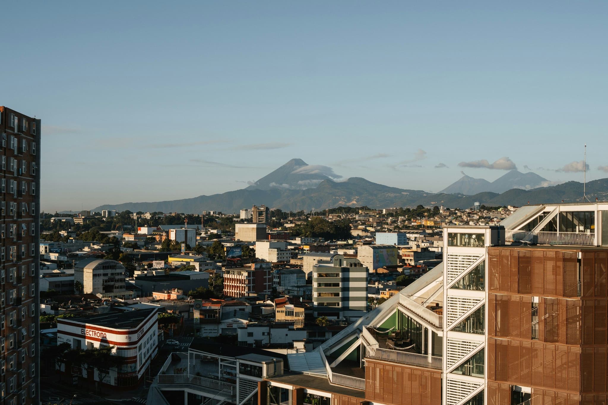 Guatemala City from above, with mountain in the background
