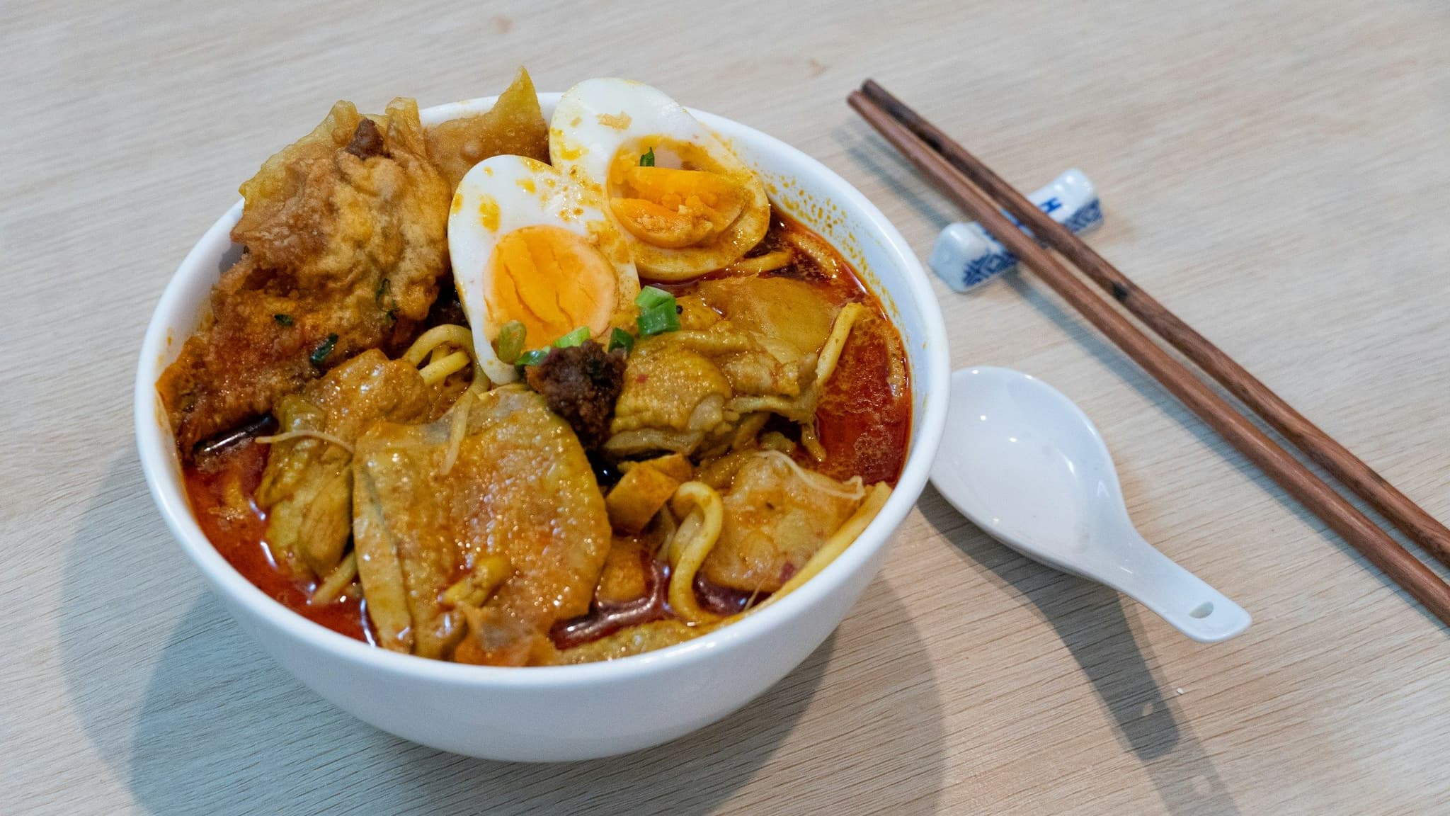 A bowl of curry laksa