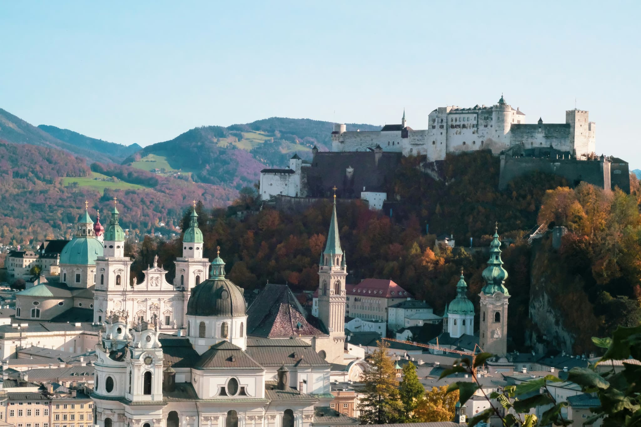 Salzburg valley with the river and the mountains and castles