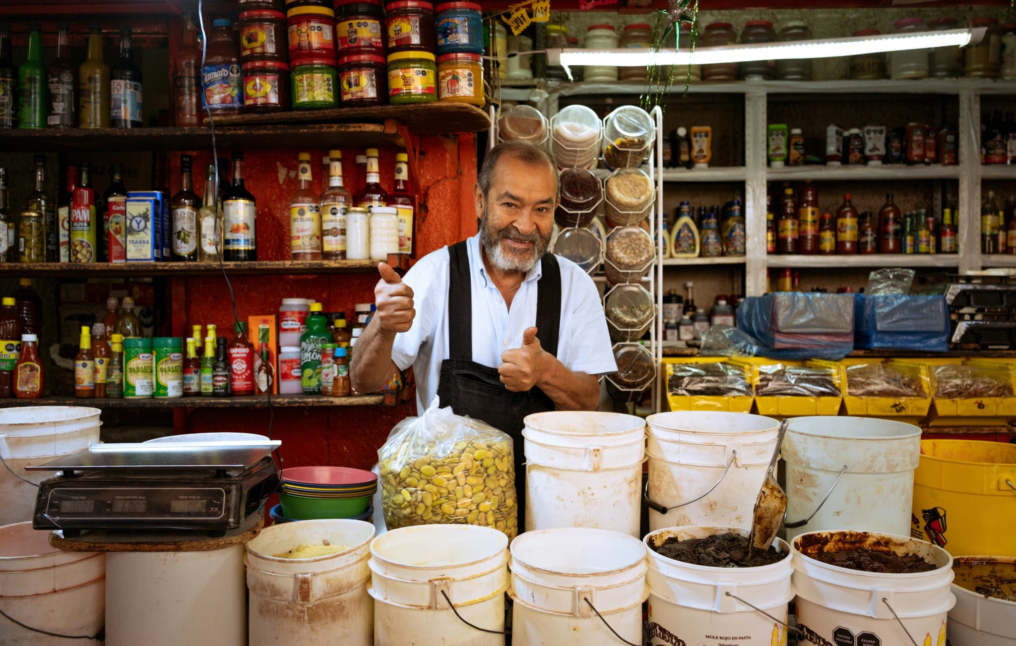 A vendor at a market stall