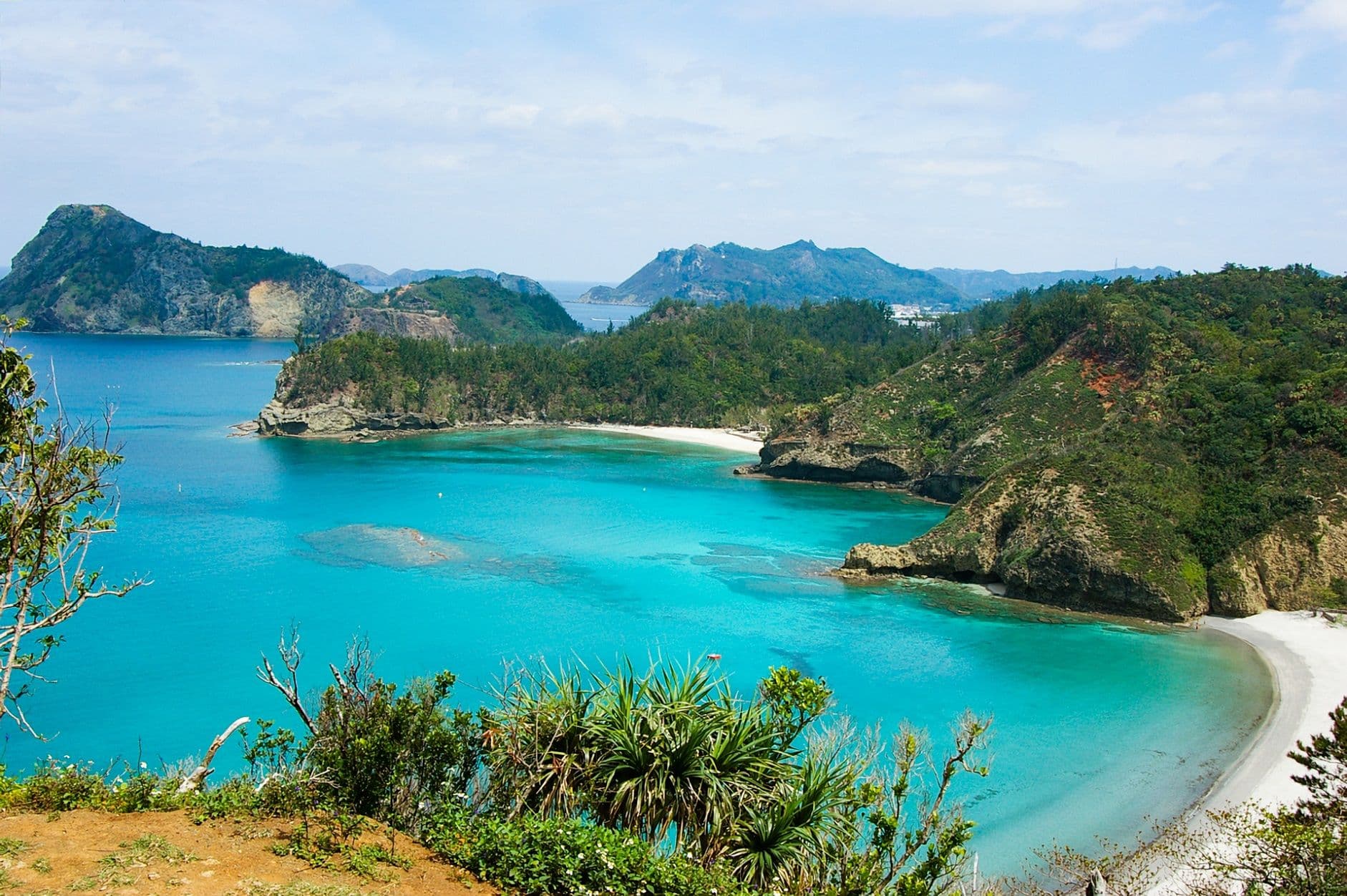 Ogasawara Islands with clear turqoise water and green hills