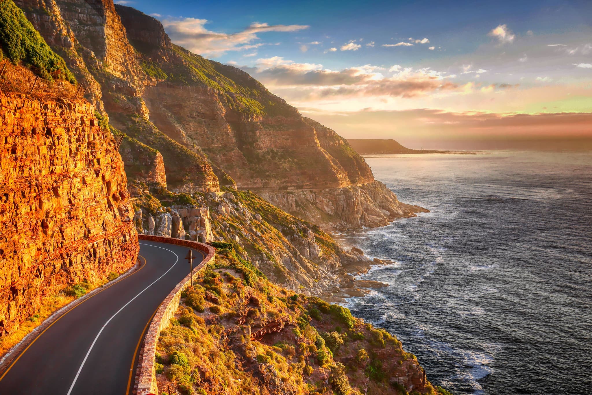 Wild Atlantic Way coastal road along the west coast of Ireland at sunset