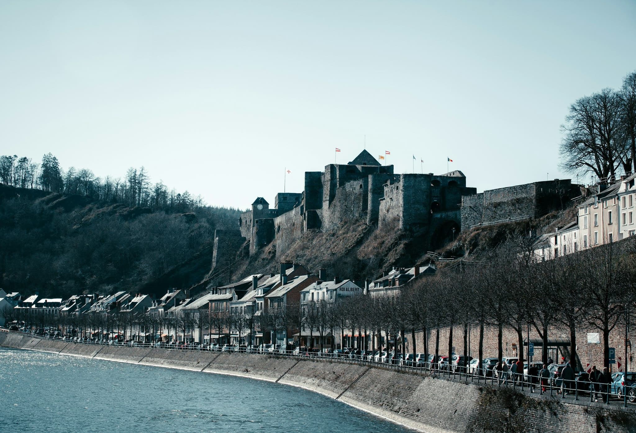 Bouillon castle on a wooded hill above the river Semois