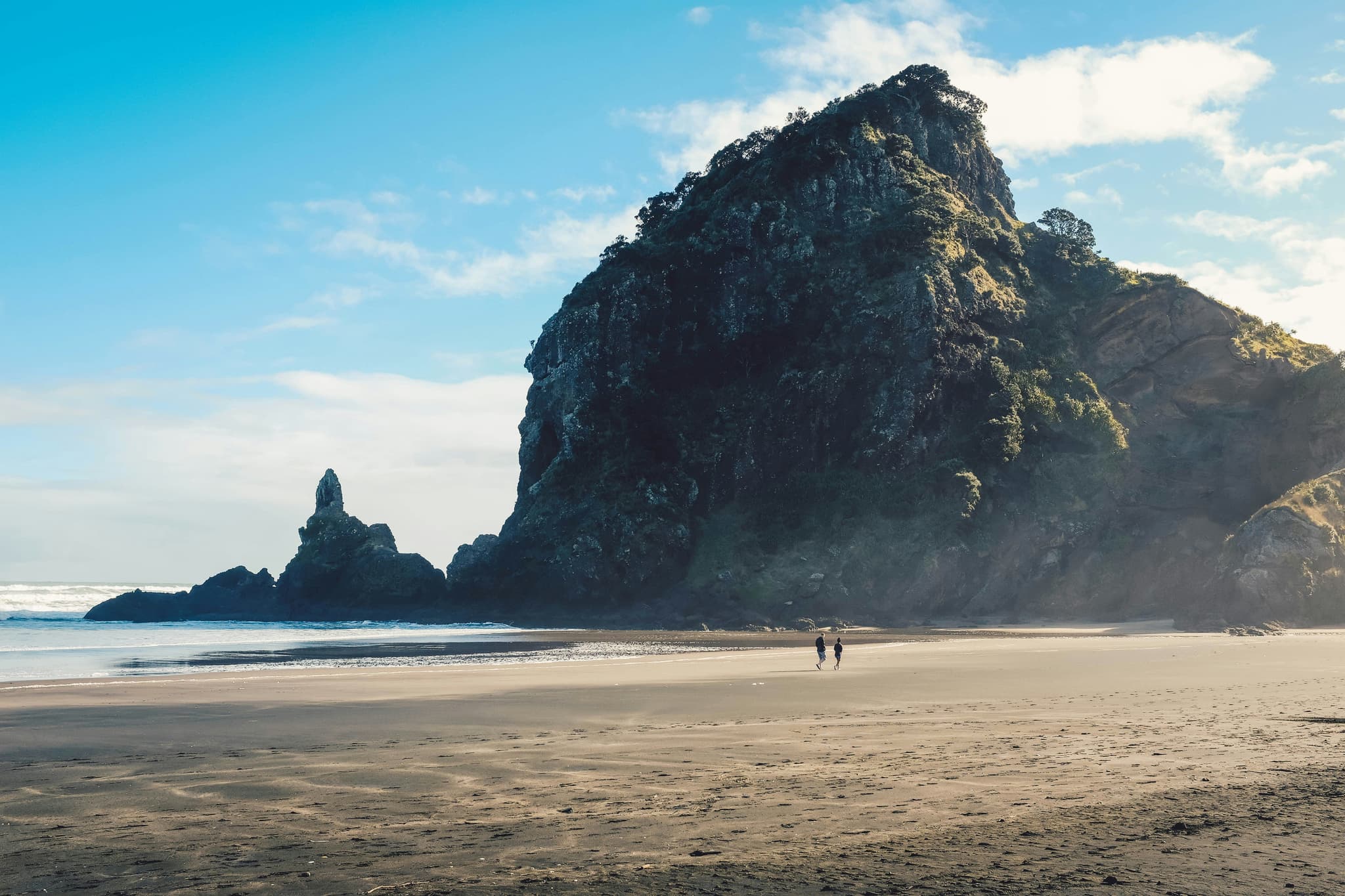 giant cliff and sea water in Piha