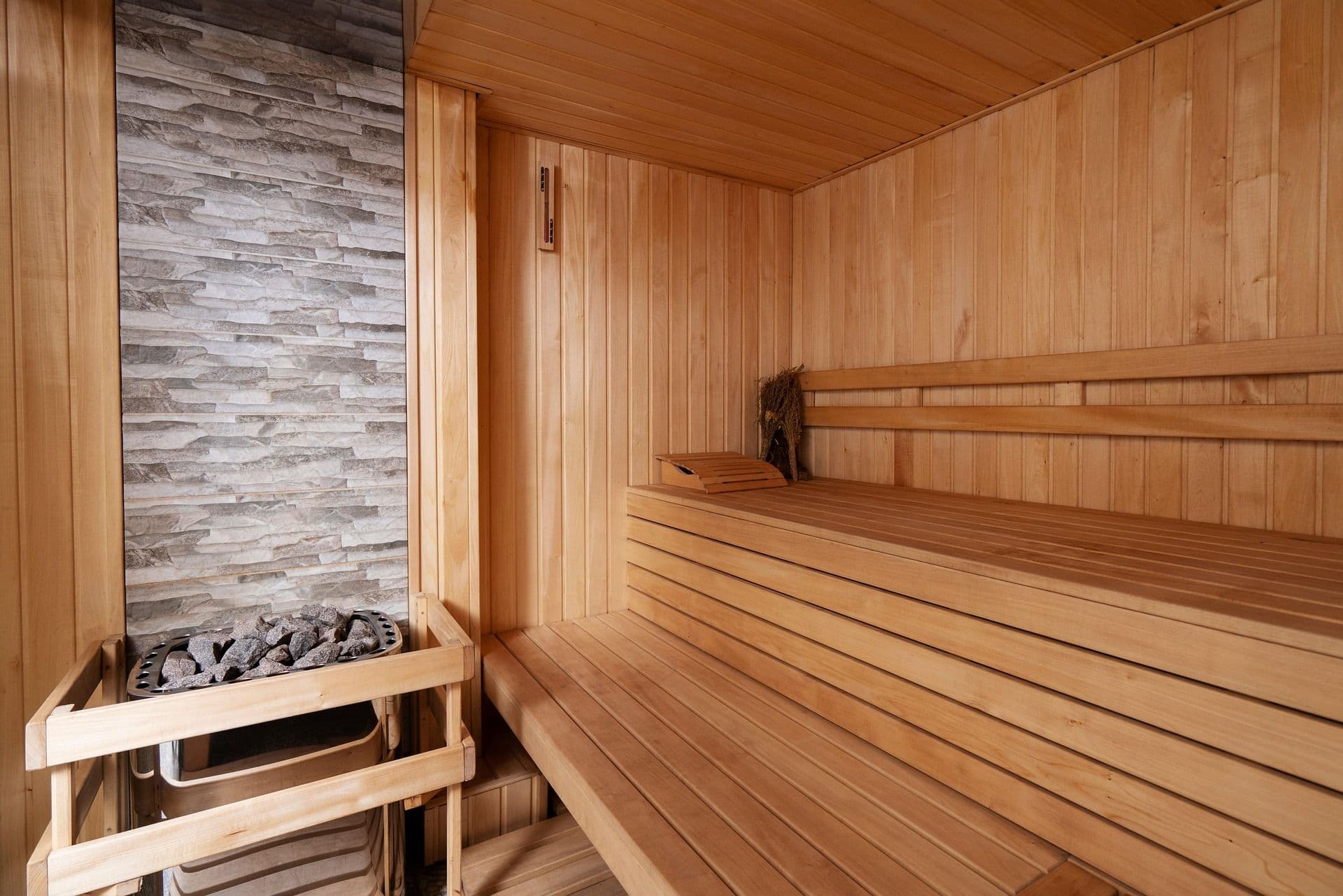 Picture of a sauna from the inside with wooden benches