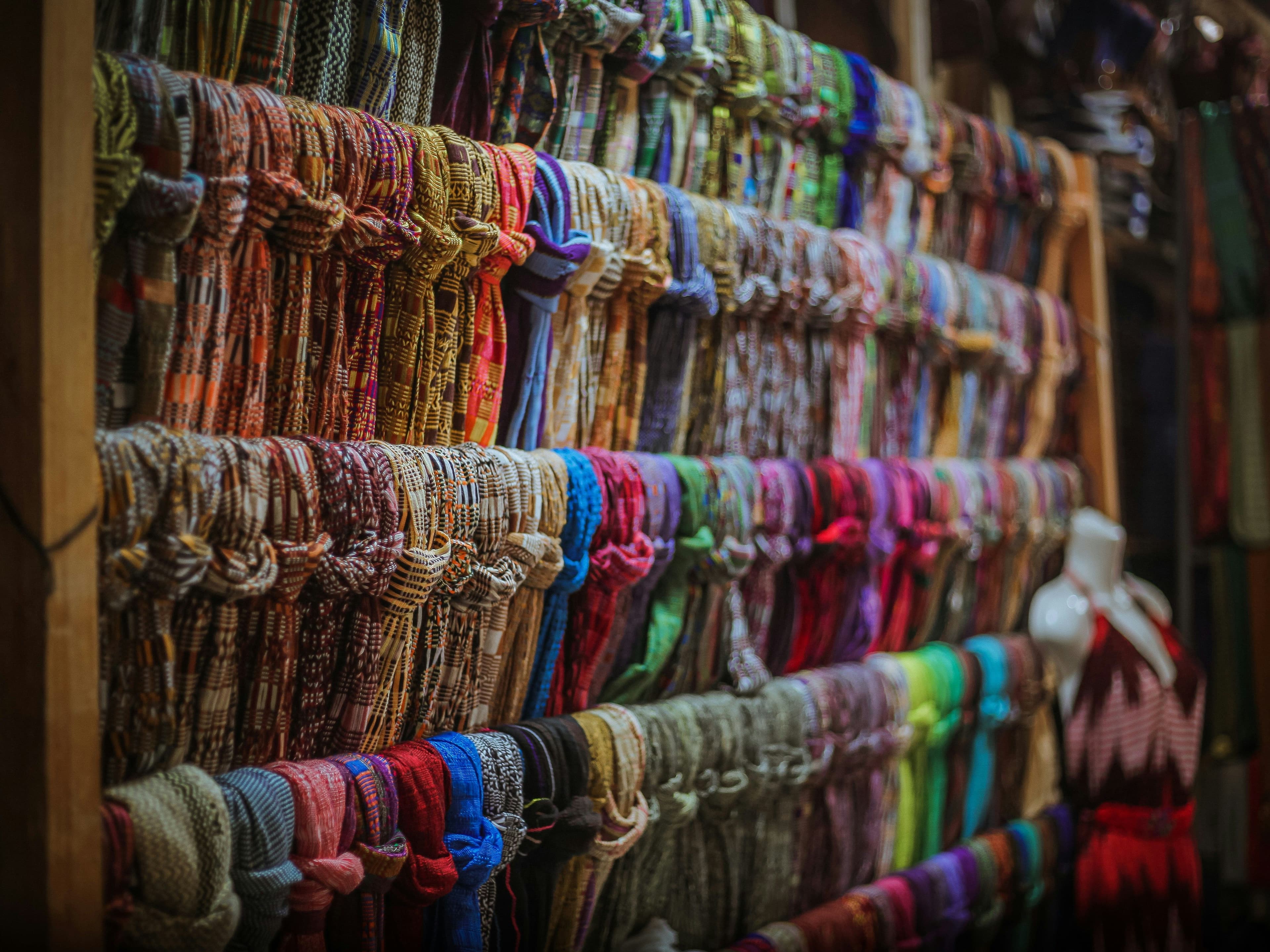 Close up of Colorful textiles hanging on a market in Guatemala