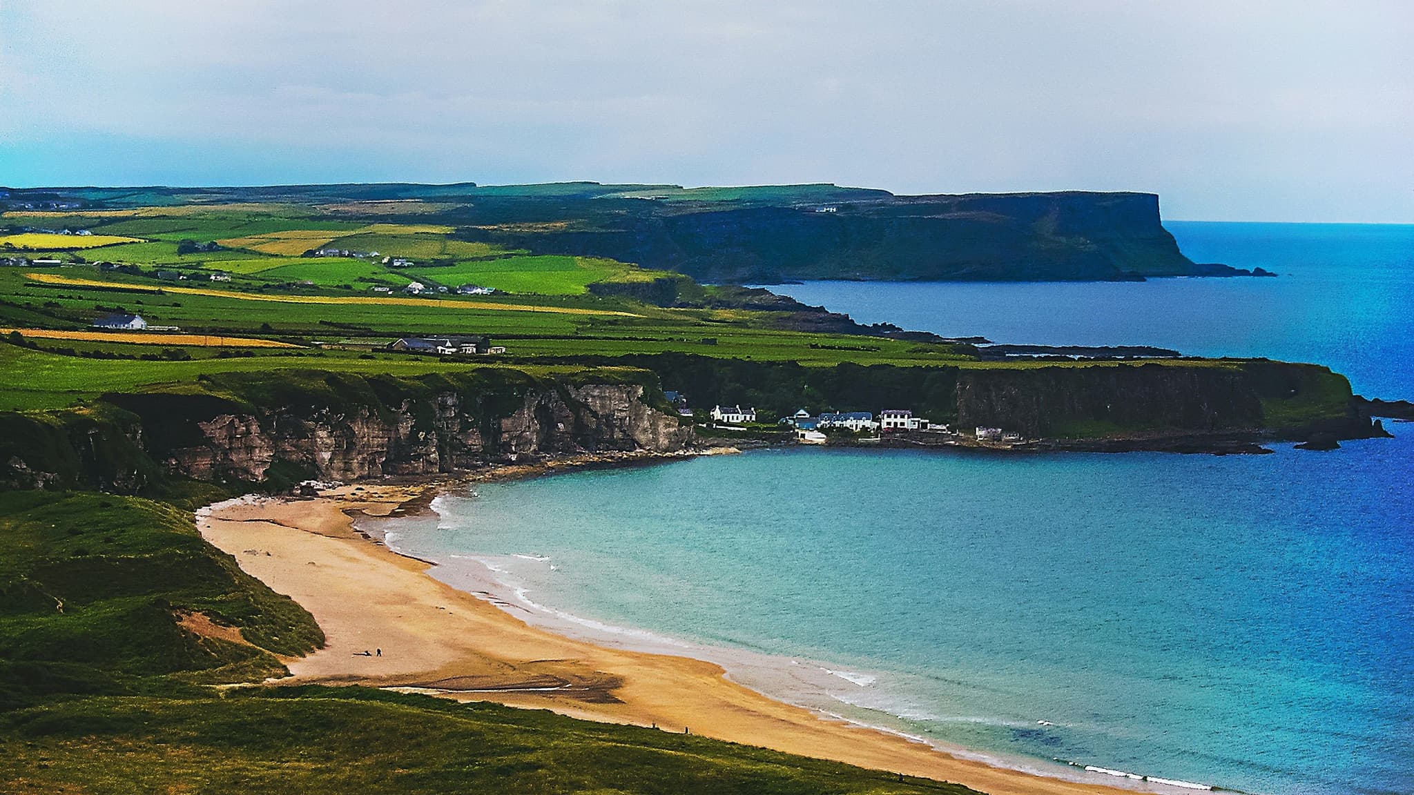 Wild Atlantic Way in Ireland the beautiful coastline from above with green grass and blue sea