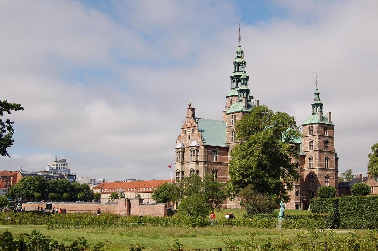 Rosenborg Castle in Copenhagen surrounded by green gardens, showing classic Danish royal architecture.
