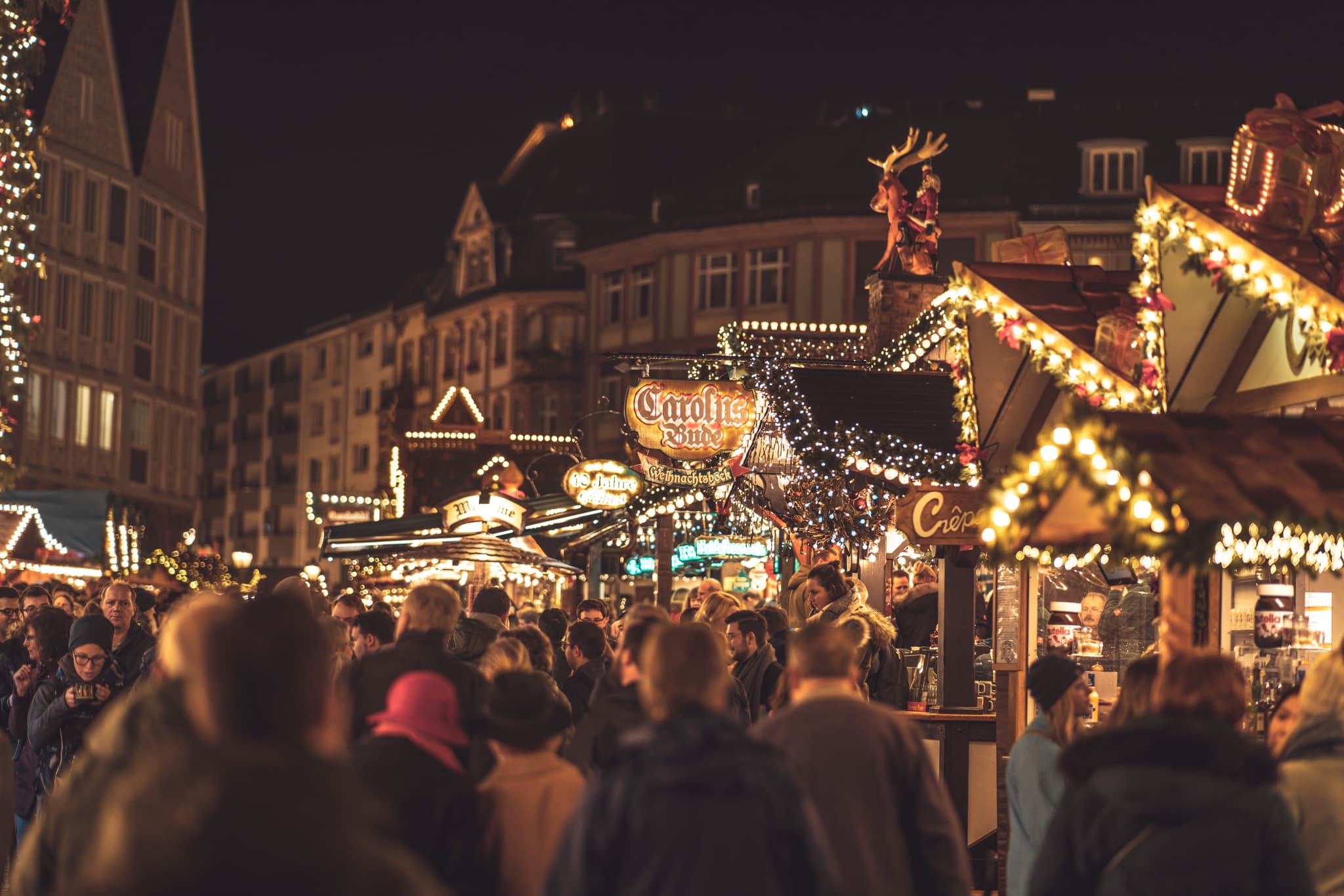 A German Christmas market decorated with lights and stalls