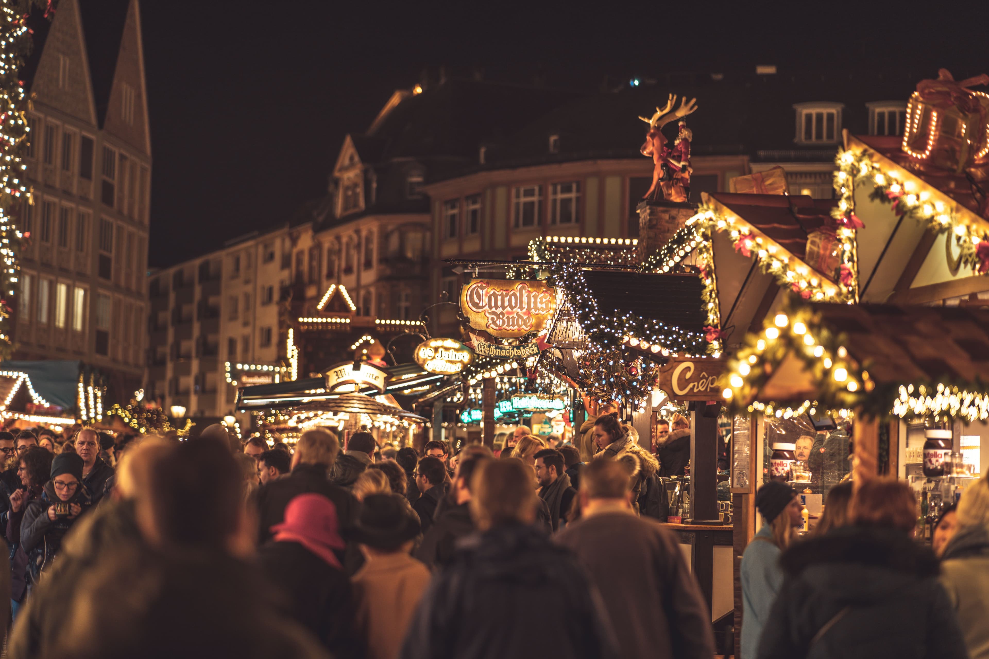 A German Christmas market decorated with lights and stalls