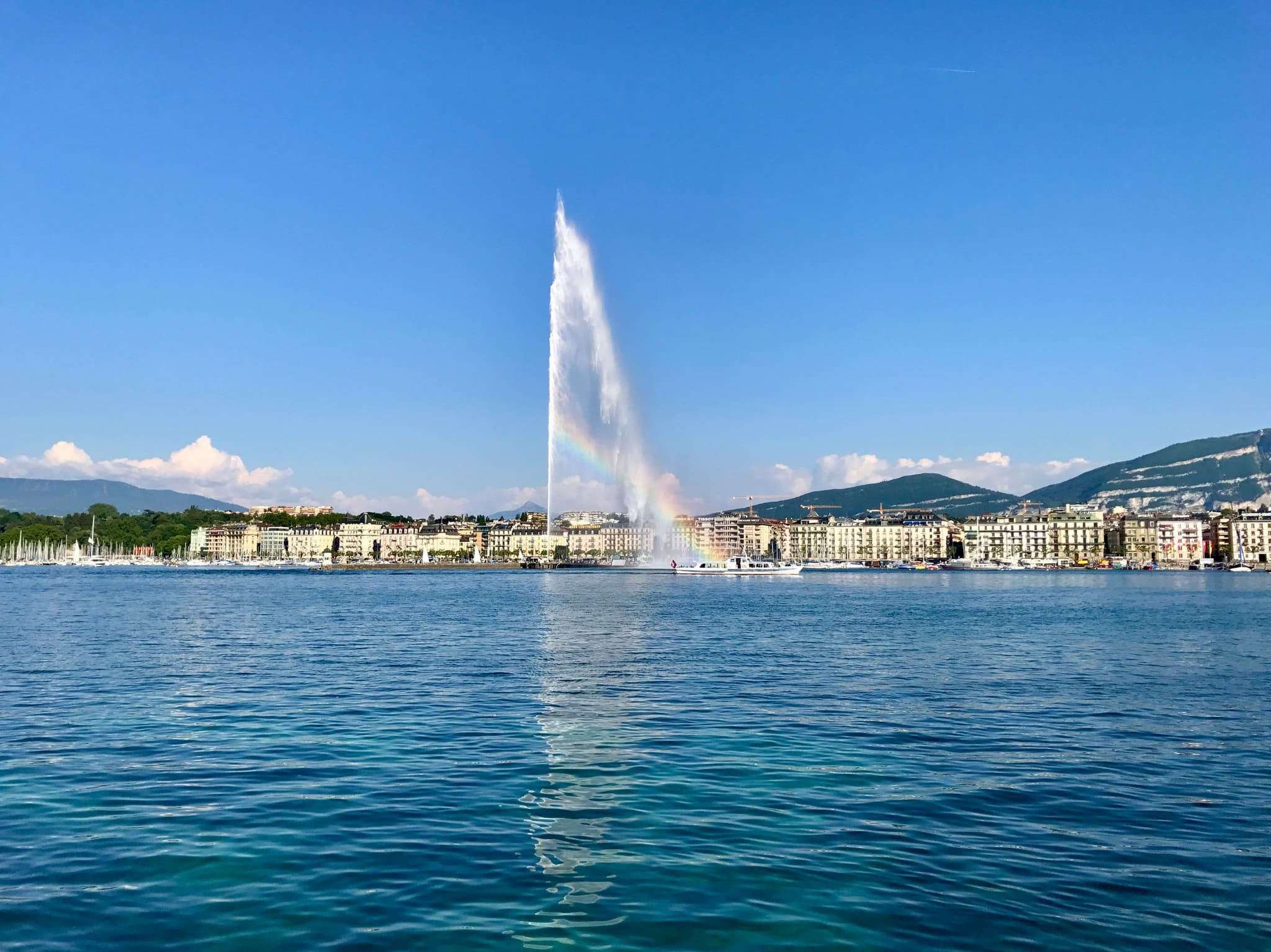 jet d’Eau fountain rising above Lake Geneva