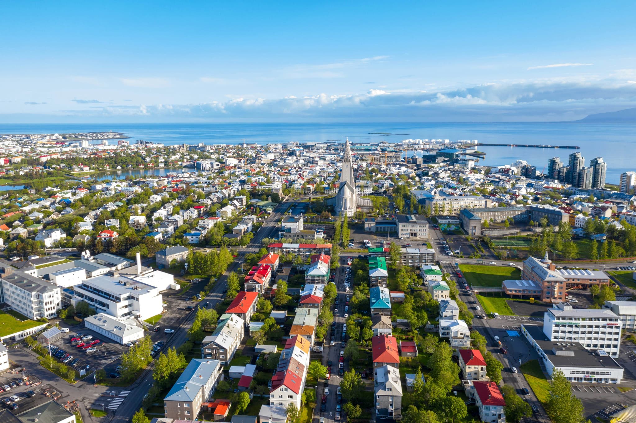 Reykjavík city from above colorful houses and blue sky