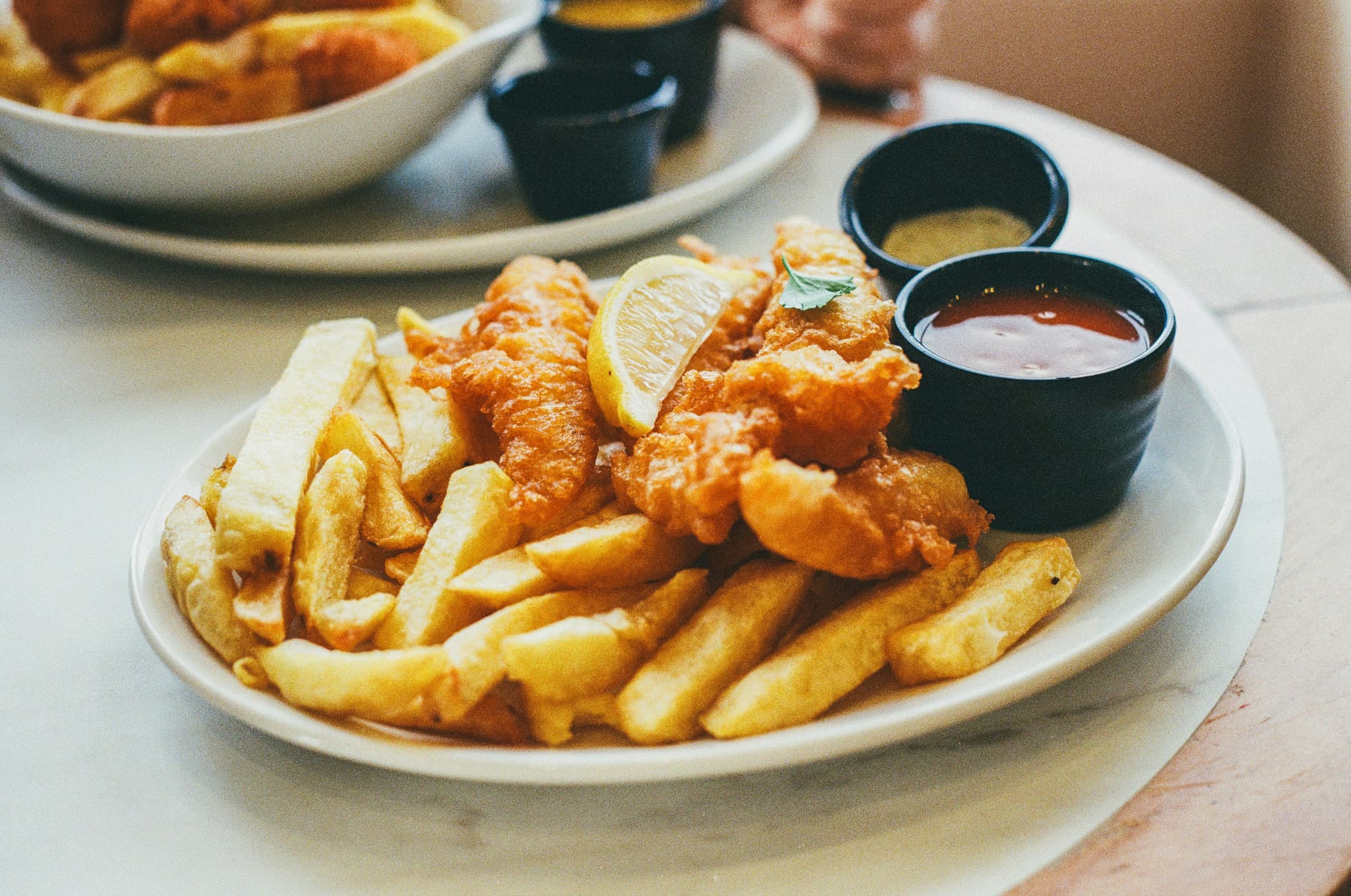 Plate with fish and chips and 2 sauces