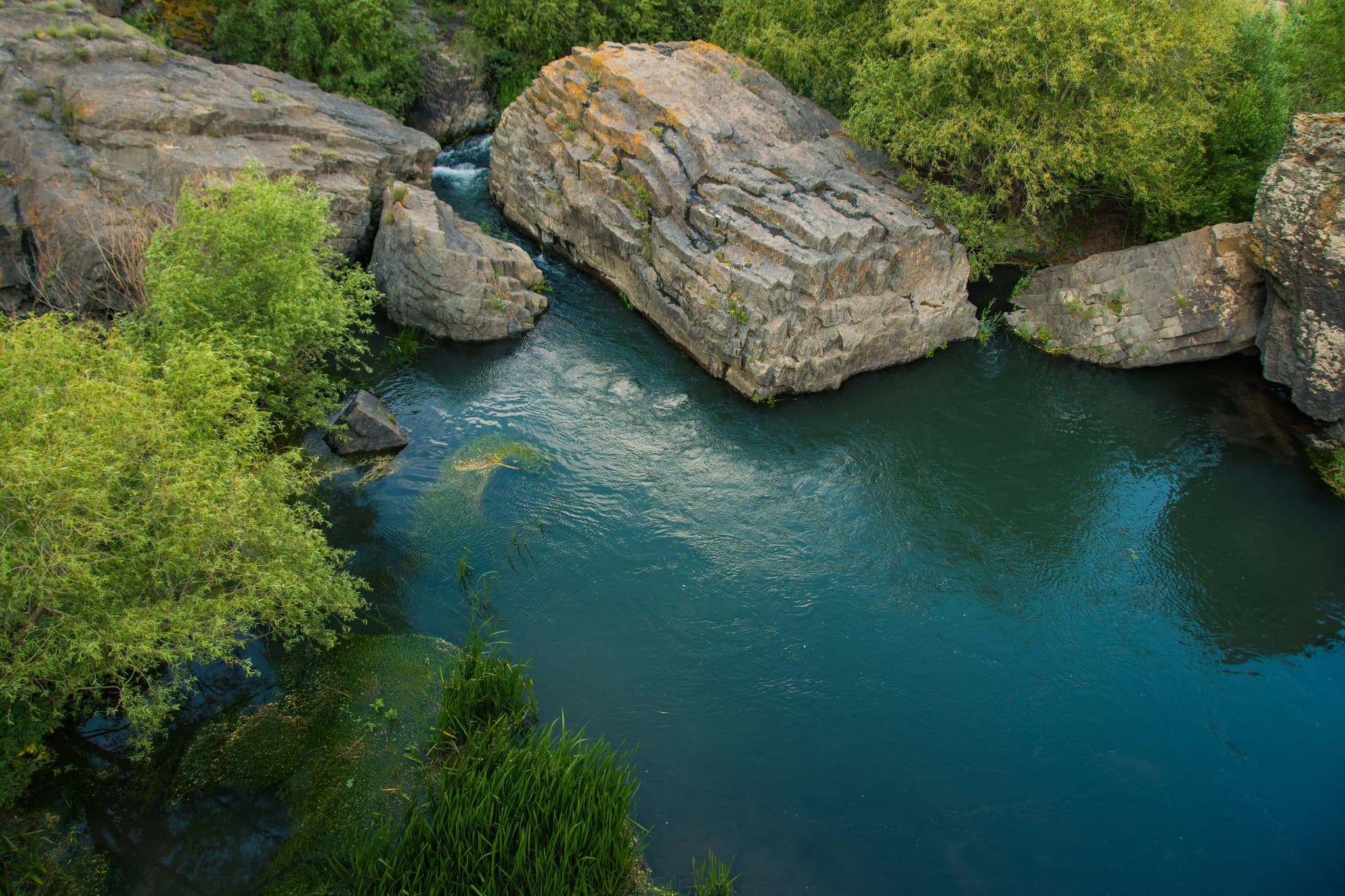 Lagoon from above with rocks surrounding
