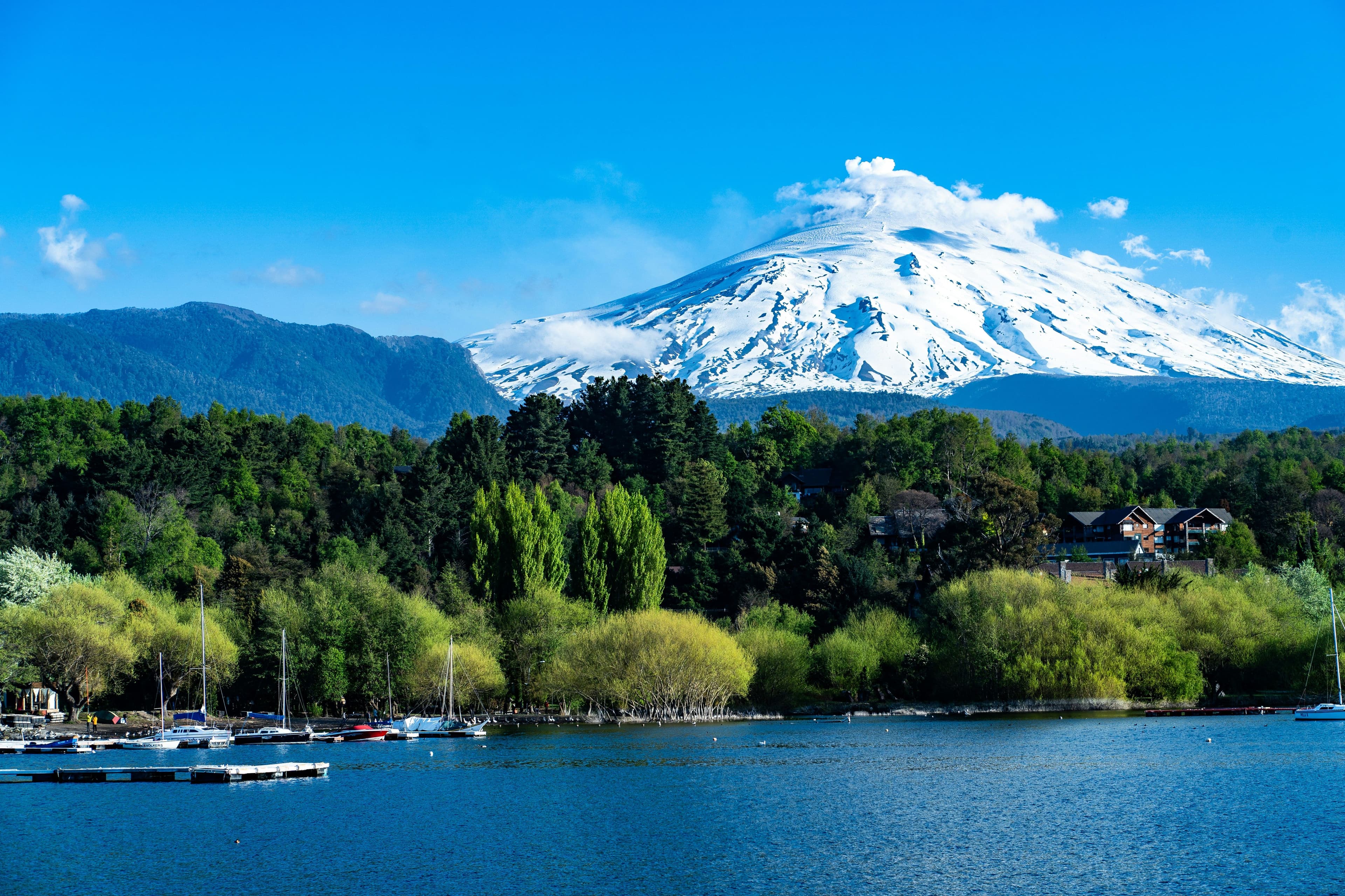 Lake of Pucón with high snow mountain in the background