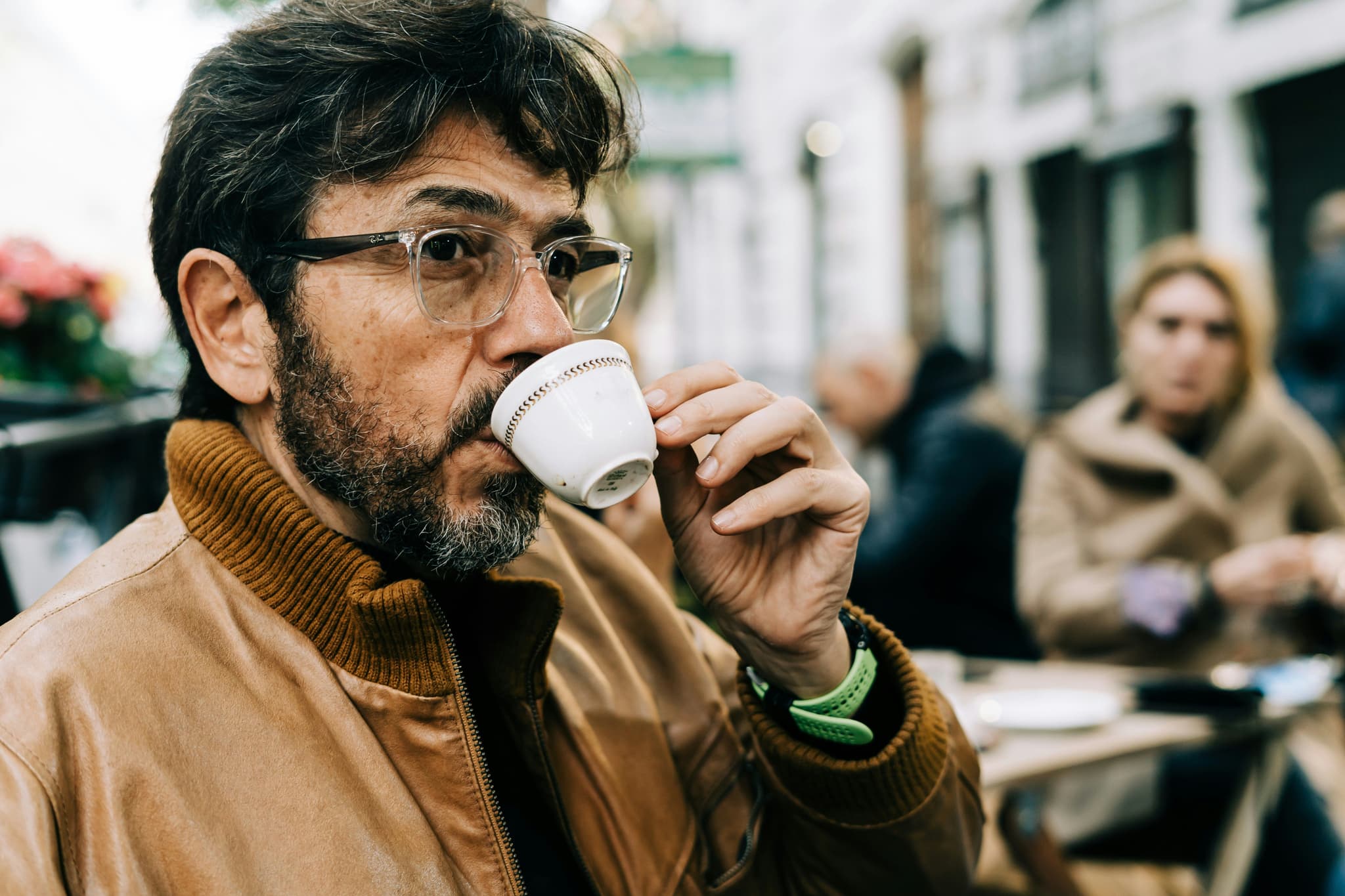A man drinking Italian coffee espresso