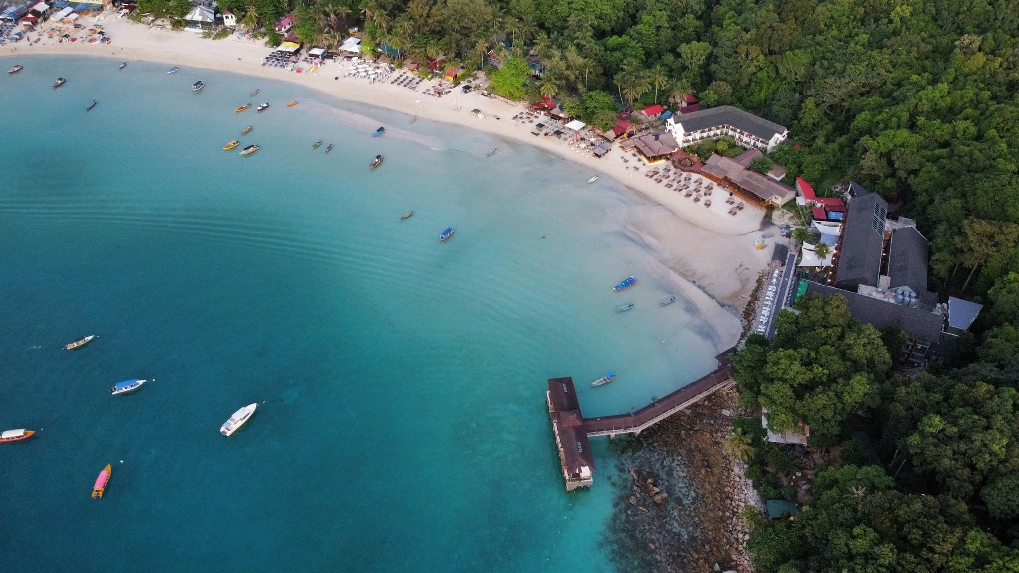 Boats moored off a beach on Perhentian Kecil