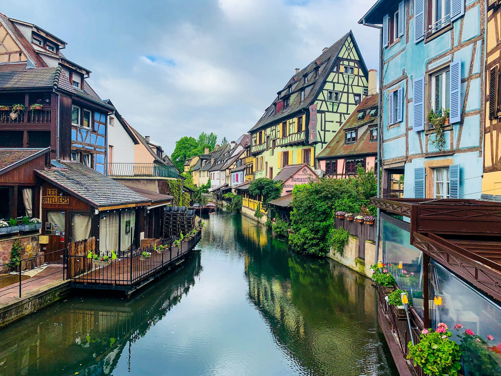 Half-timbered colorful houses along a canal in Colmar, Alsace