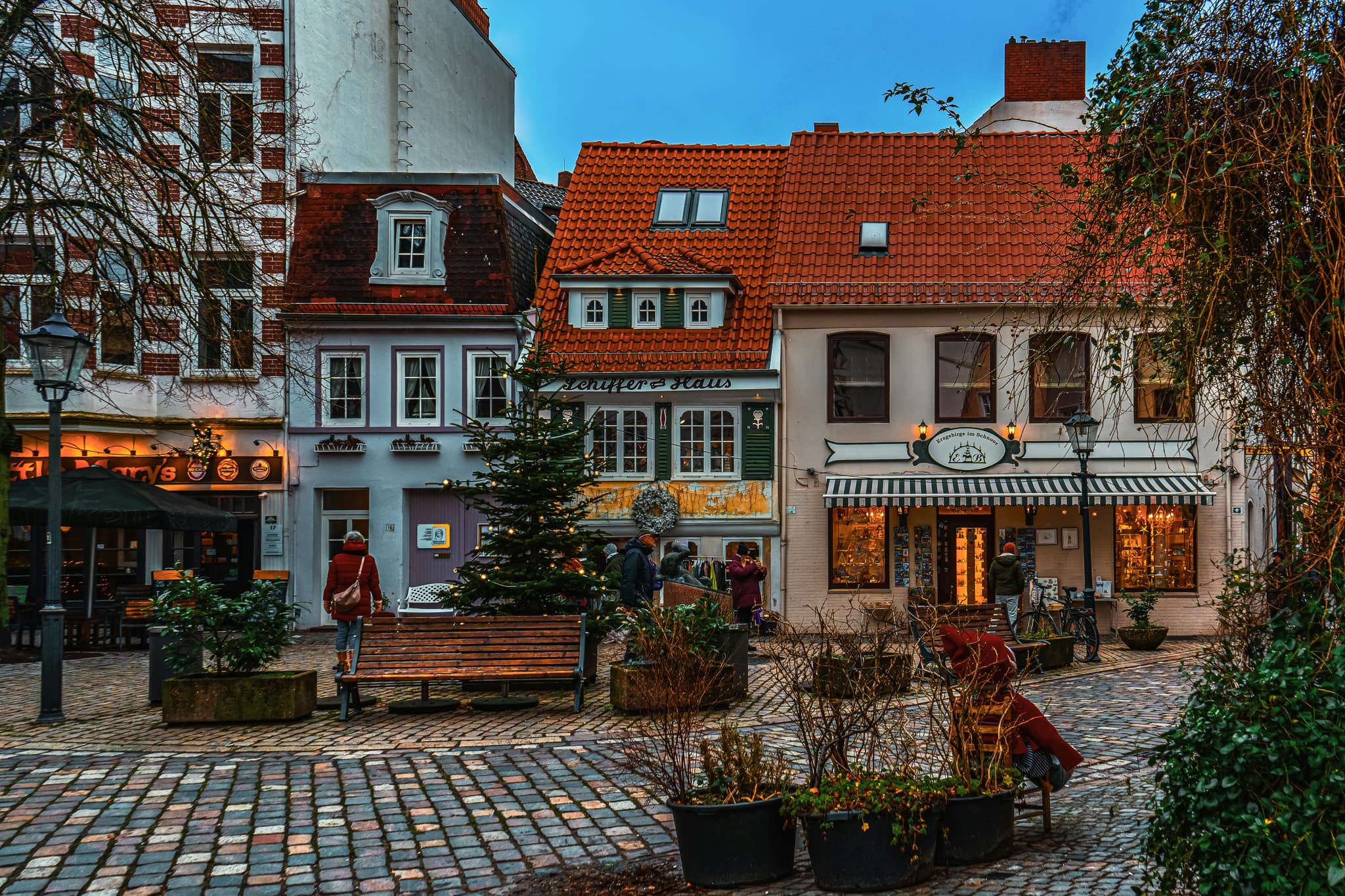 Cobble stone street with red brick houses in Bremen