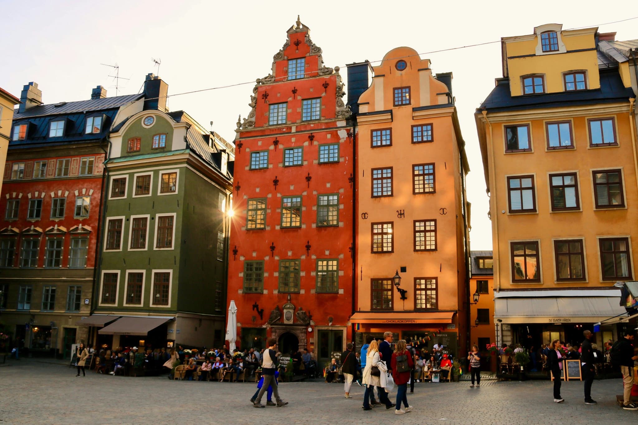 Colourful old buildings along a cobblestone street in Gamla Stan, Stockholm