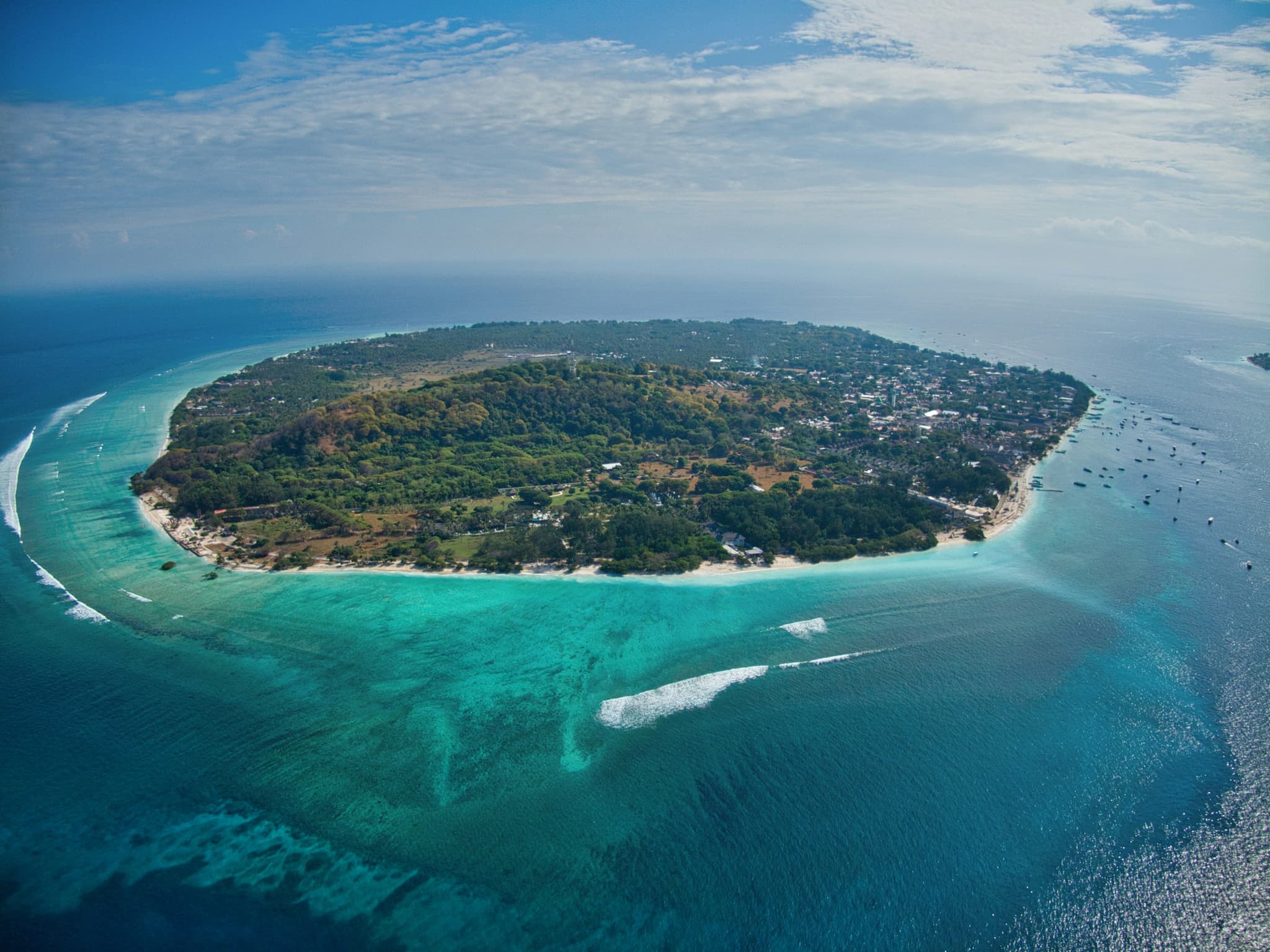 Gili island from above surrounded by blue water