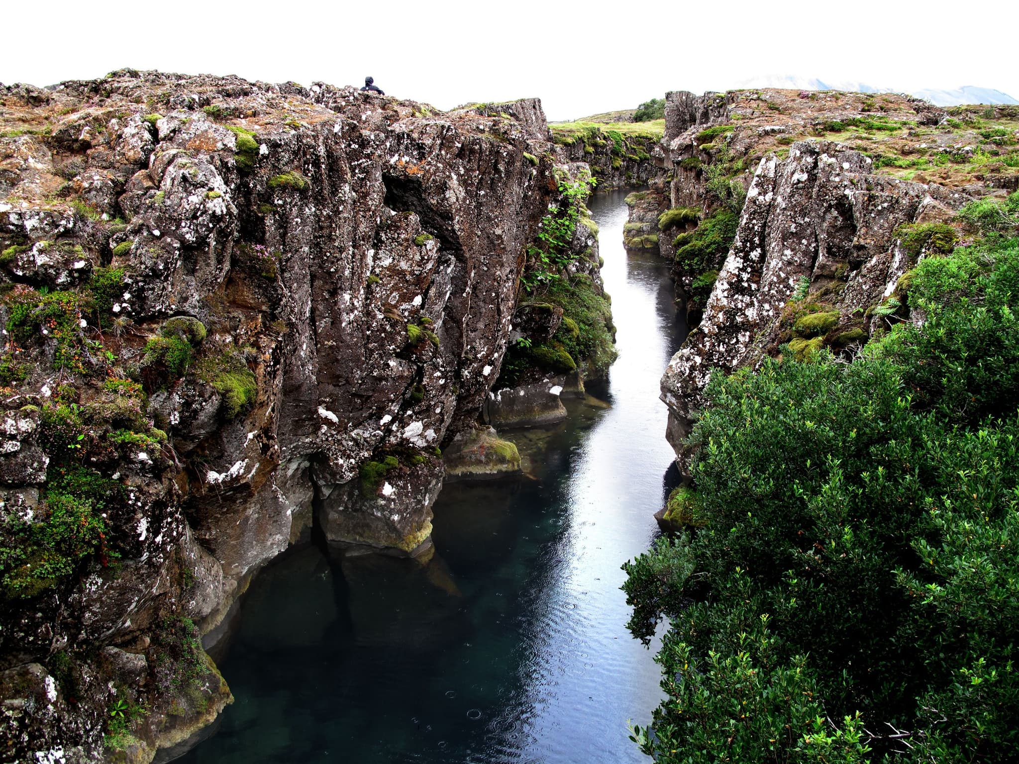 Cliffs and water in Þingvellir National Park, the Silfra Fissure, continental drifting
