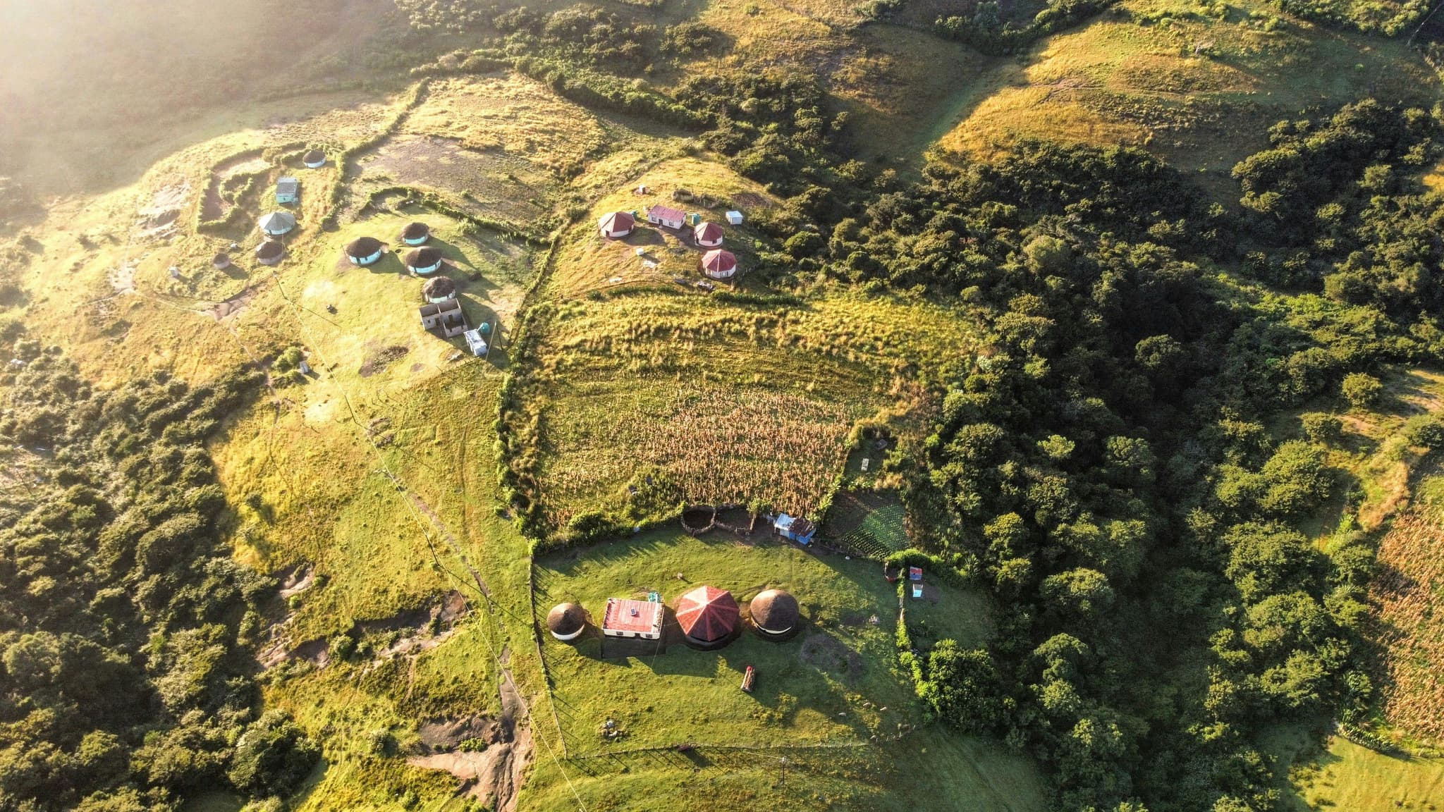 The Eastern Cape reserve from above: green landscape and small cottages