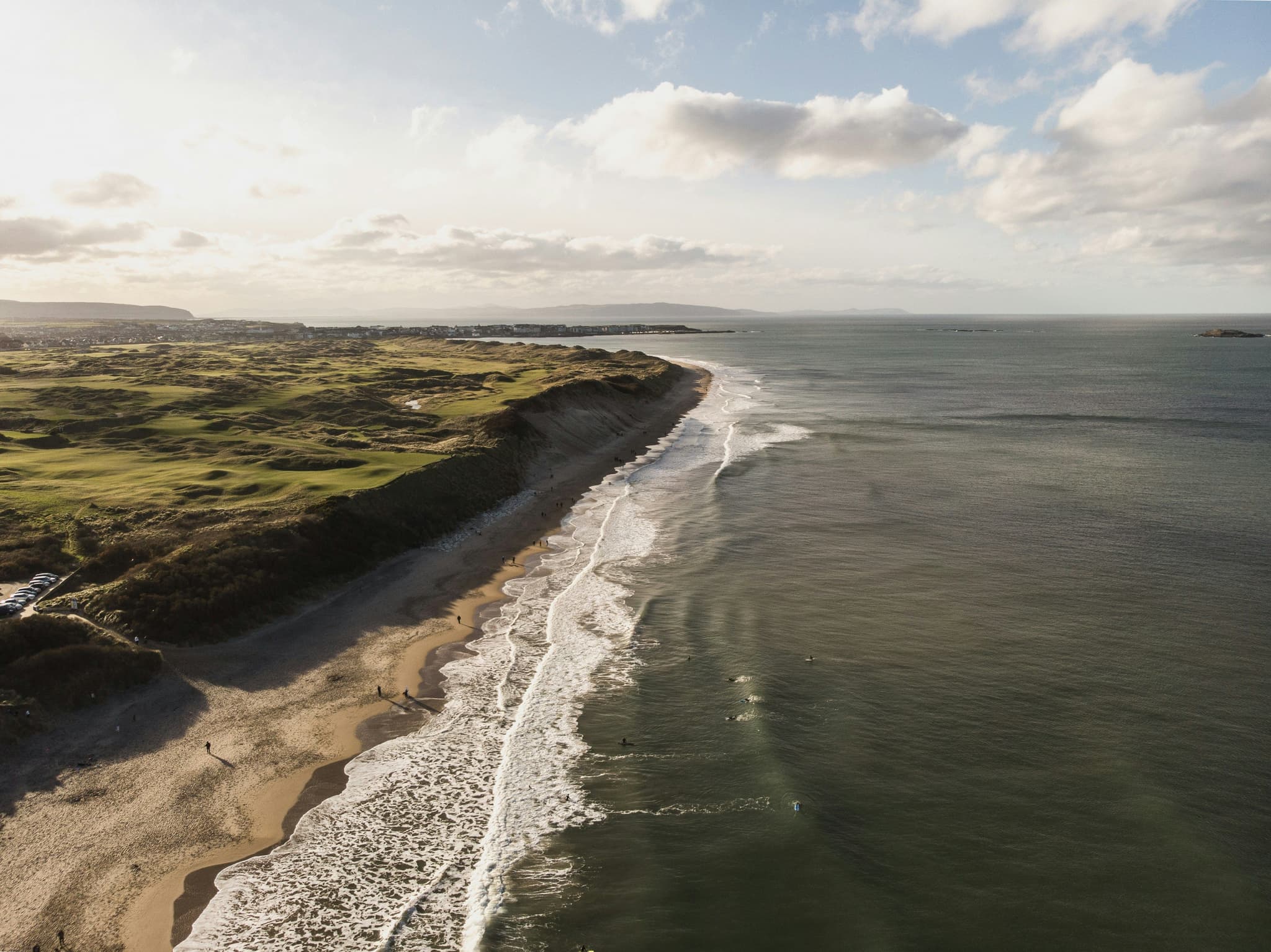 coastline of Portrush: cliffs and sea and beach