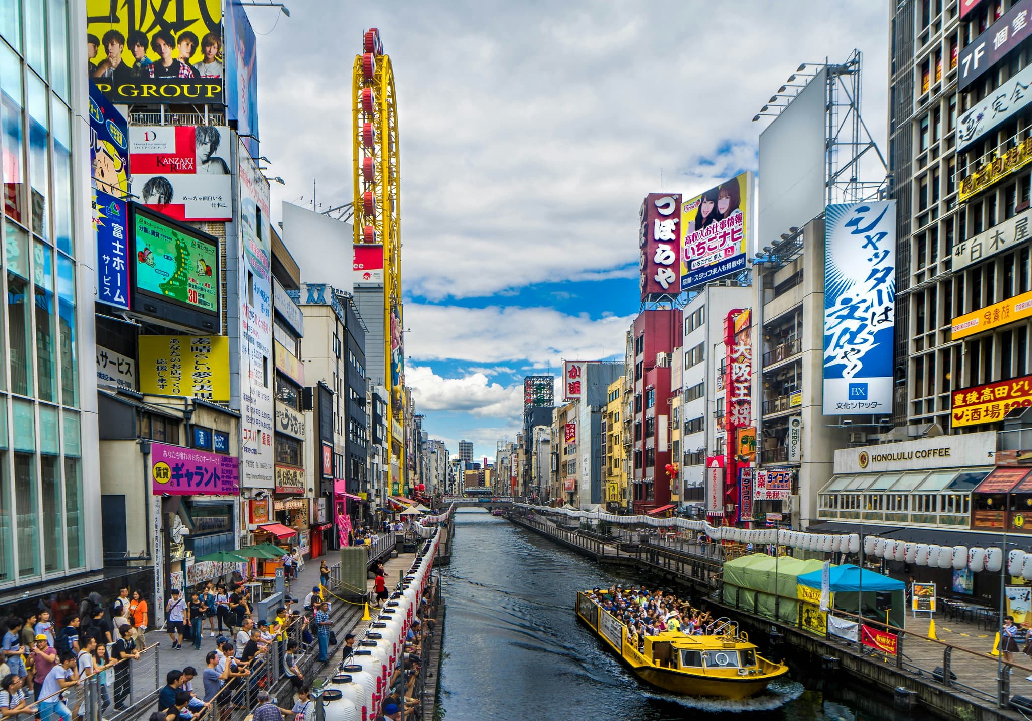 canal in Dotonbori with streets with neon lights