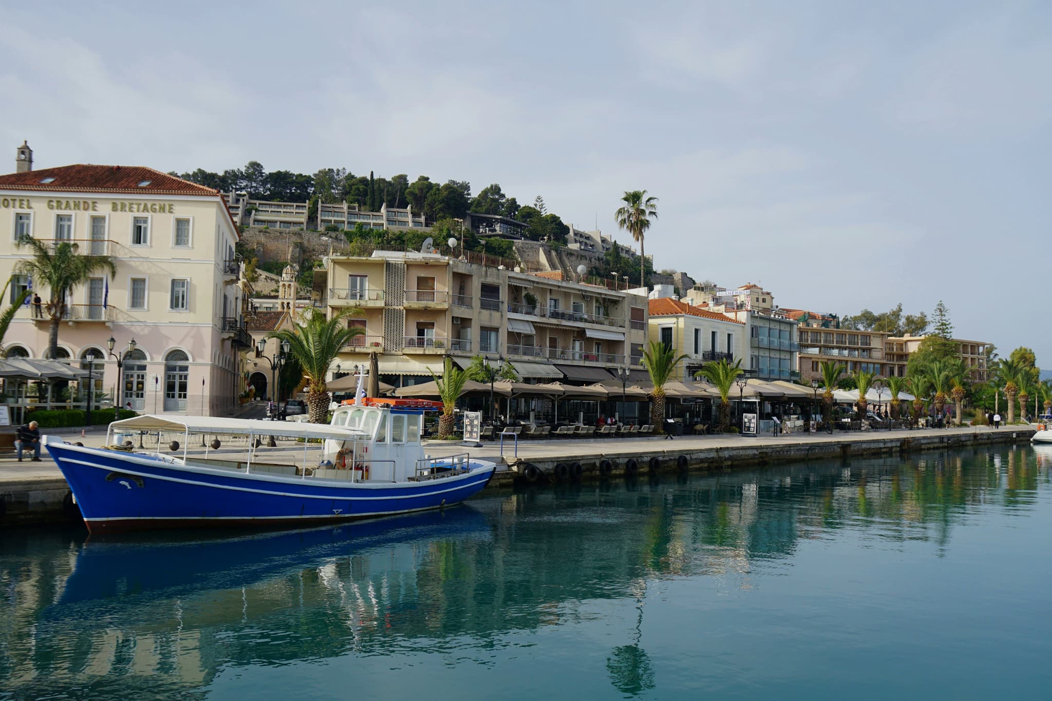Blue boat on the water in Nafplio harbour in the Peloponnese