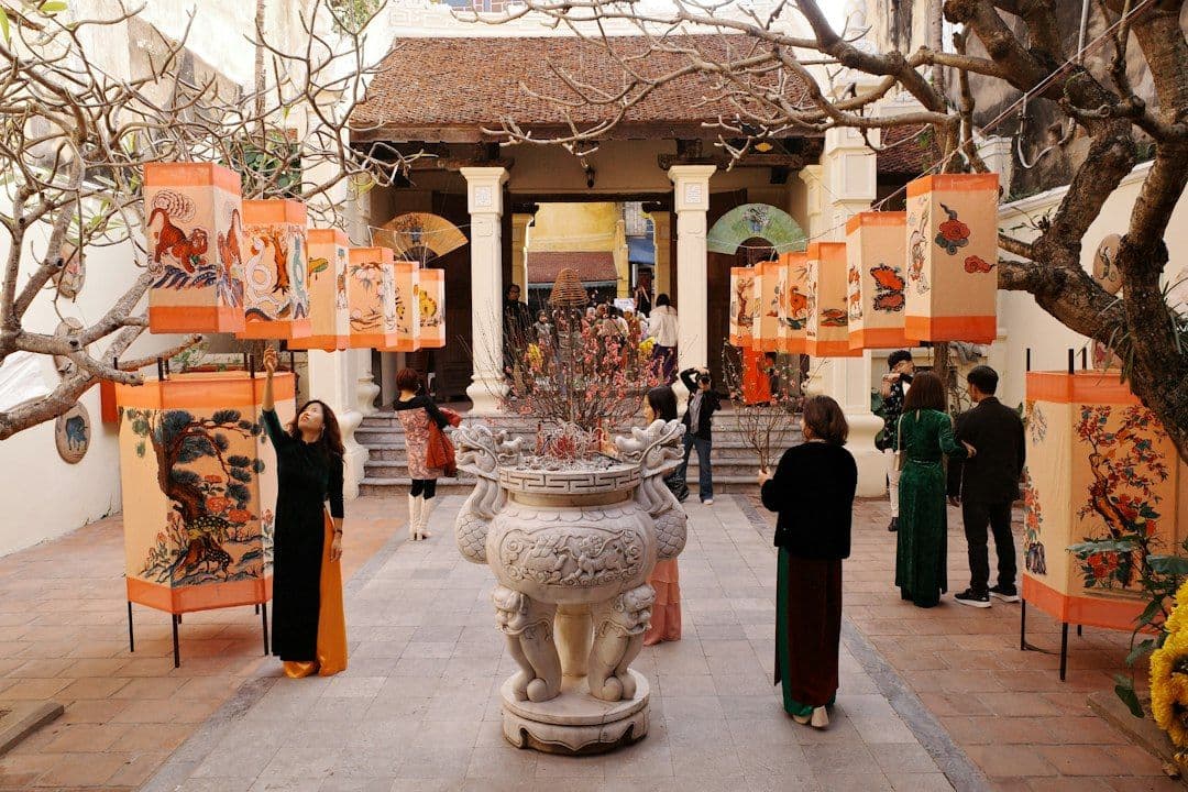 Visitors gathered at Đình Kim Ngân, a historic communal house in Hanoi's Old Quarter, during Tet