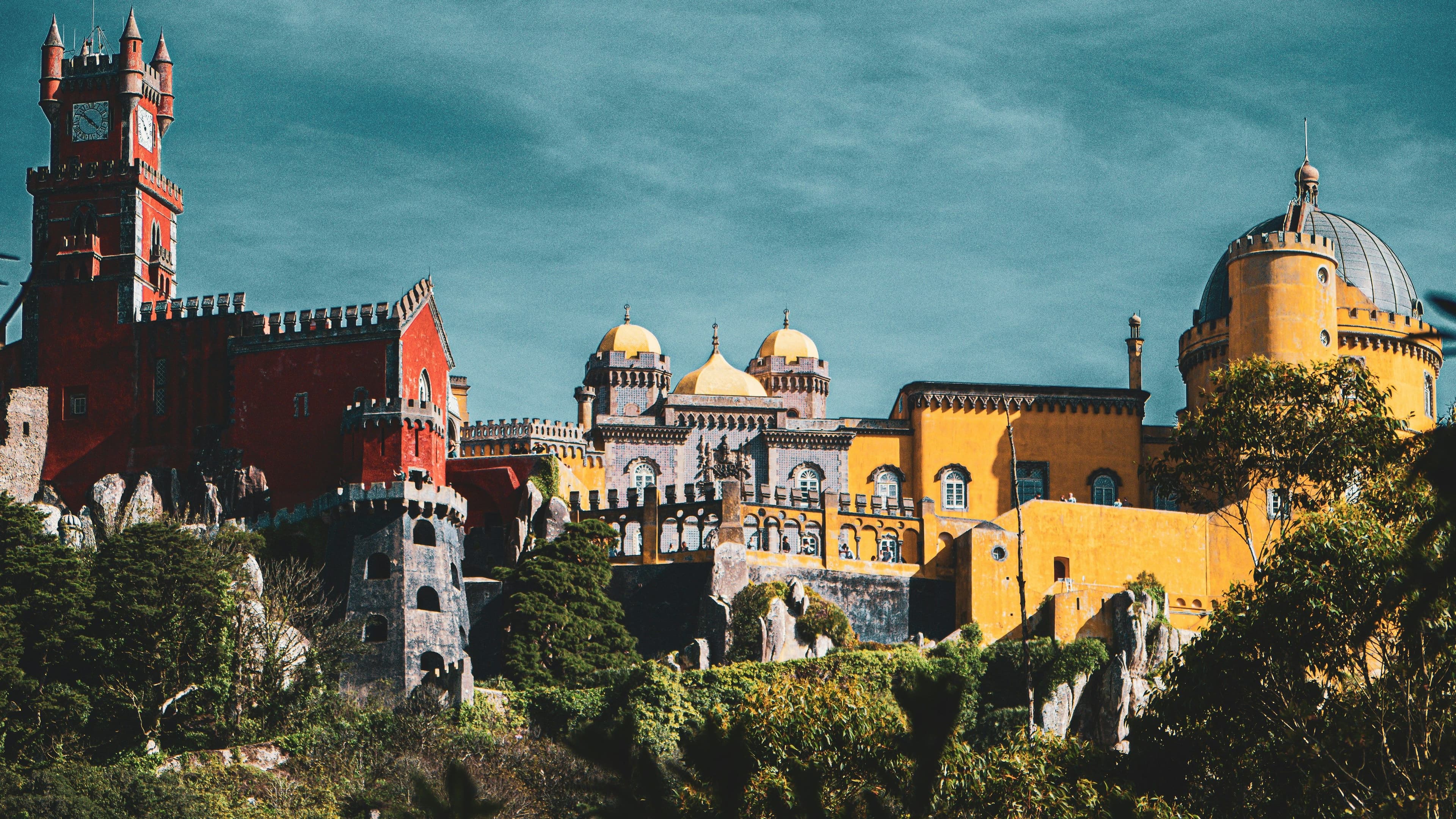 Colourful castle buildings on a hill in Sintra
