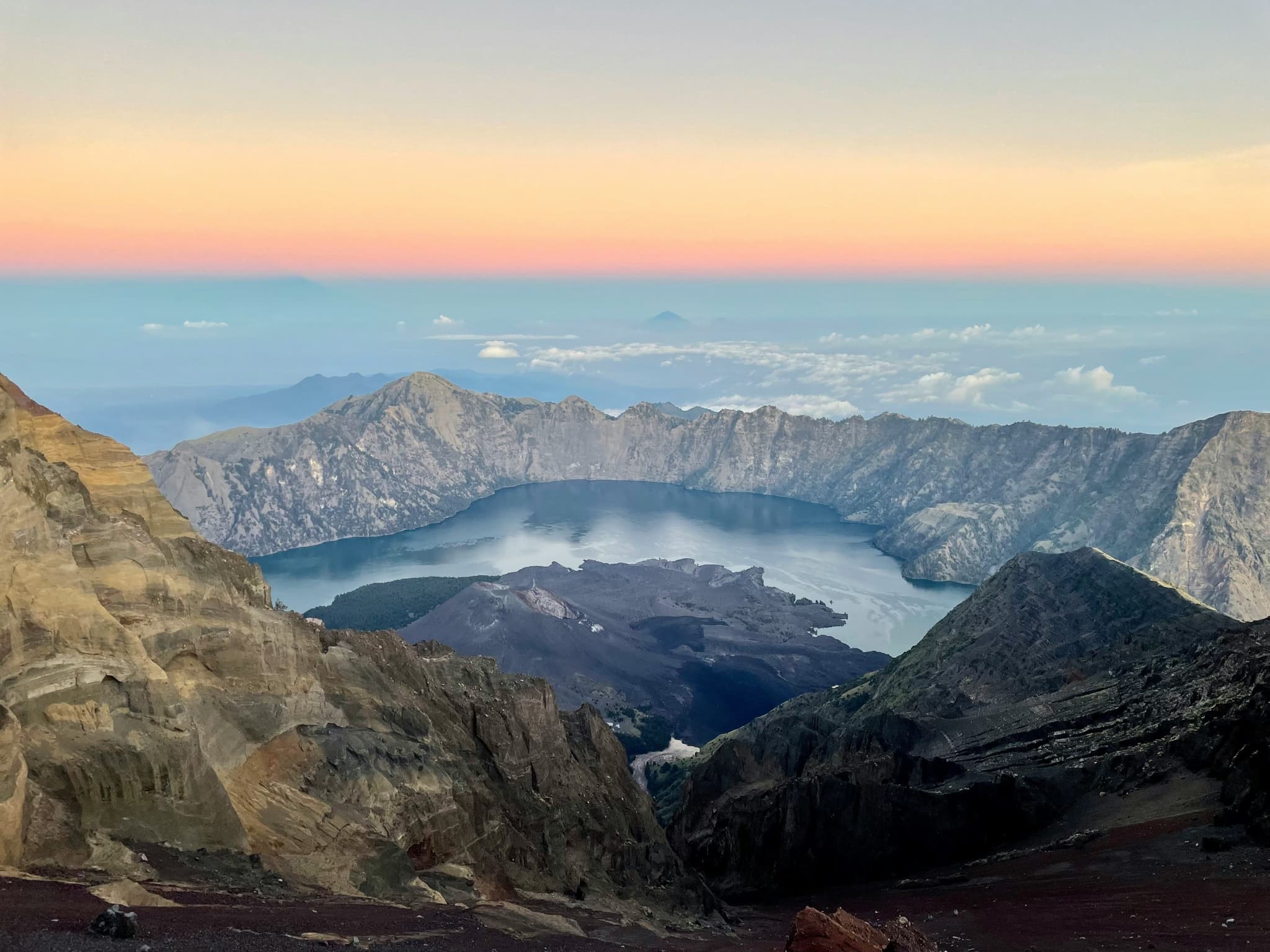 Open view from Mount Rinjani with mountains and sunset