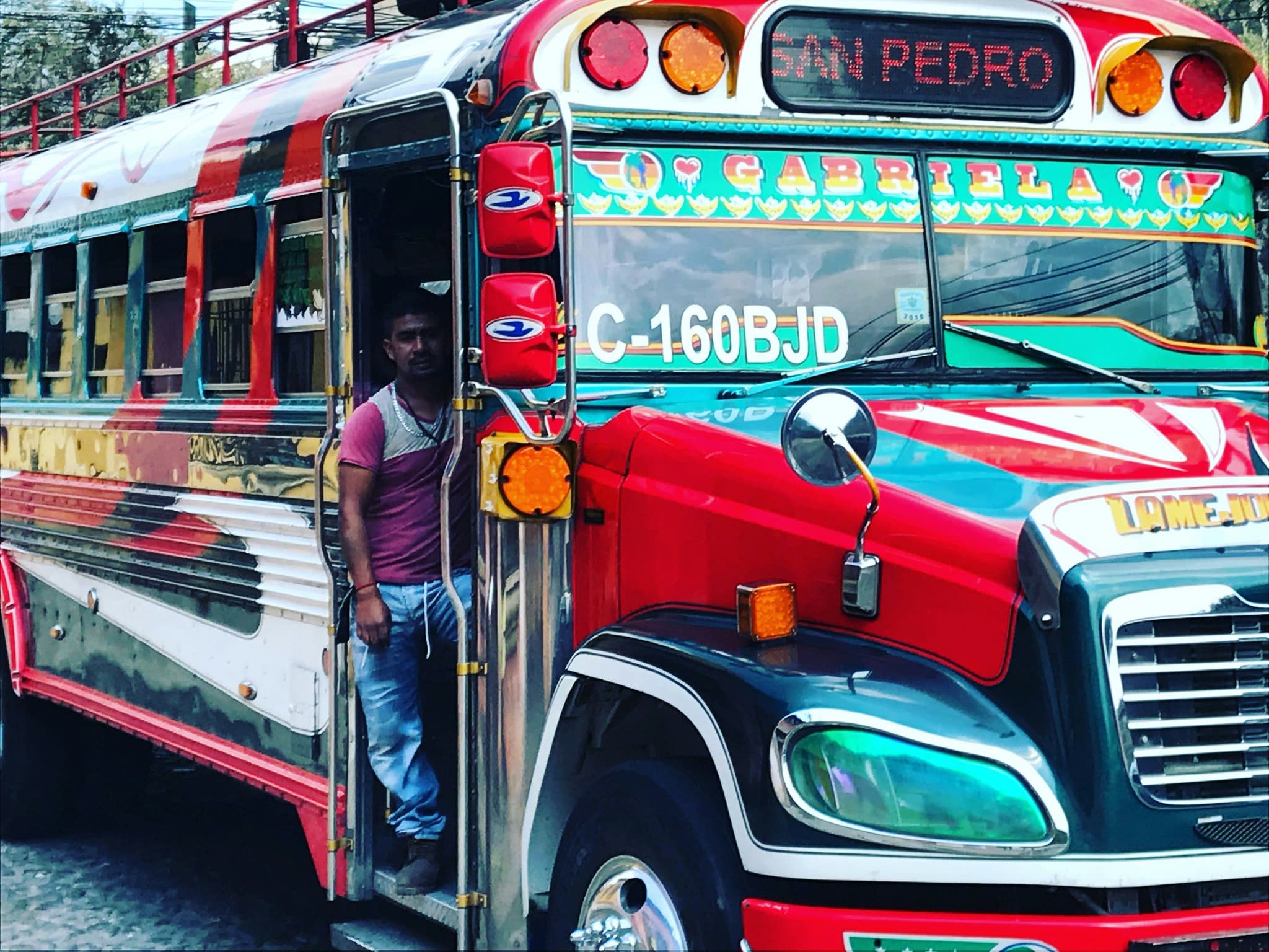 Chicken bus local colorful bus in Guatemala heading to san pedro
