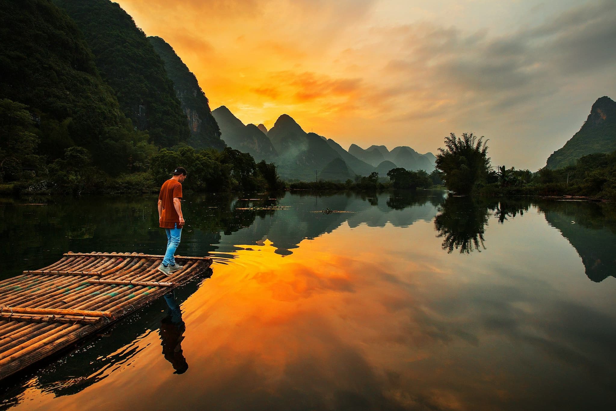 A bamboo raft on a river among the karst hills around Yangshuo
