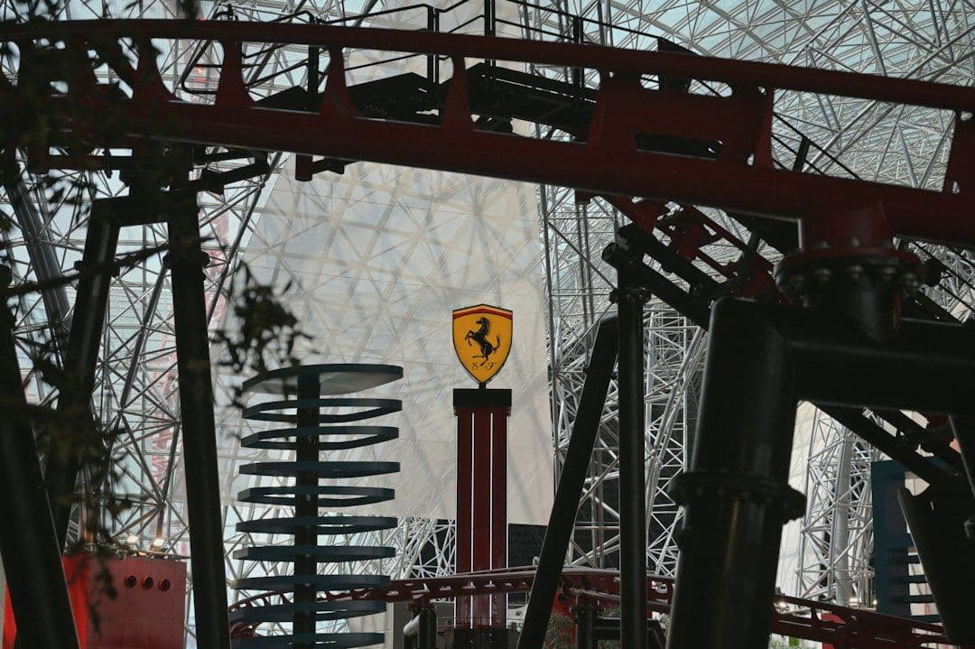 A Ferrari-branded roller coaster structure, standing in for Ferrari World