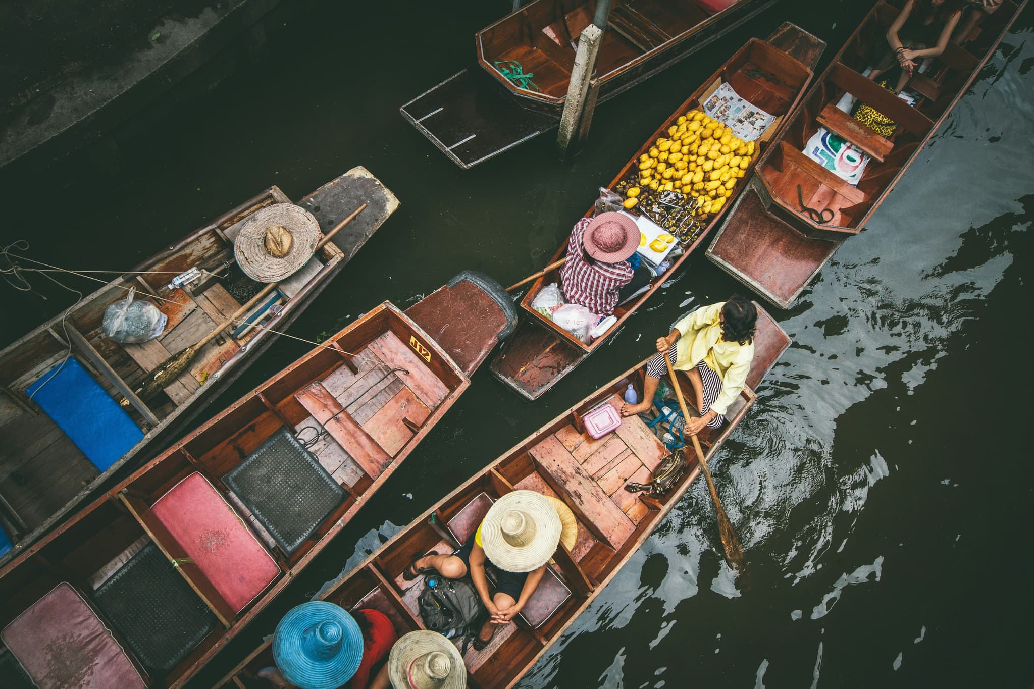 Floating market boats from above on the Mekong Delta
