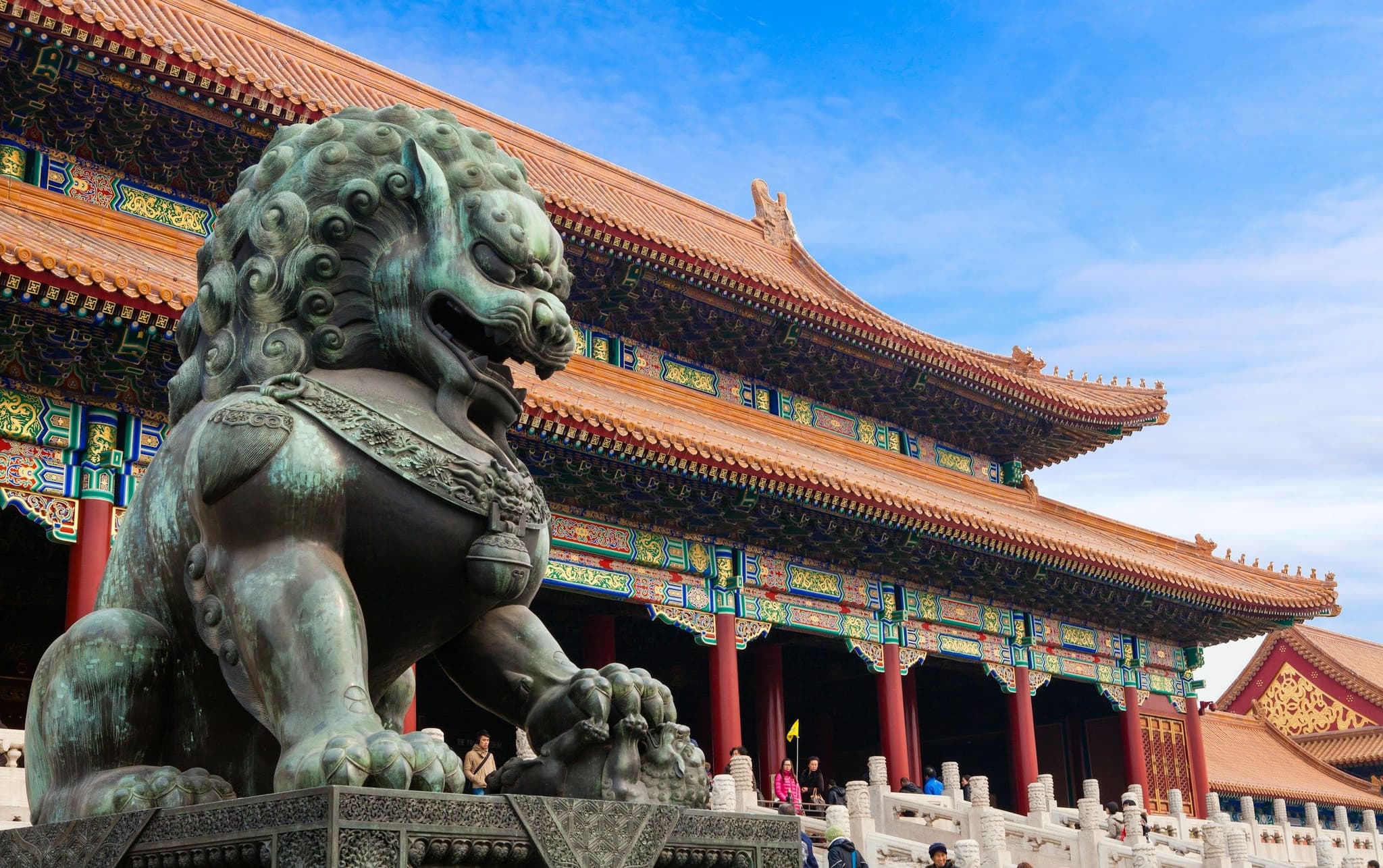A bronze guardian lion in front of the Hall of Supreme Harmony in the Forbidden City, Beijing