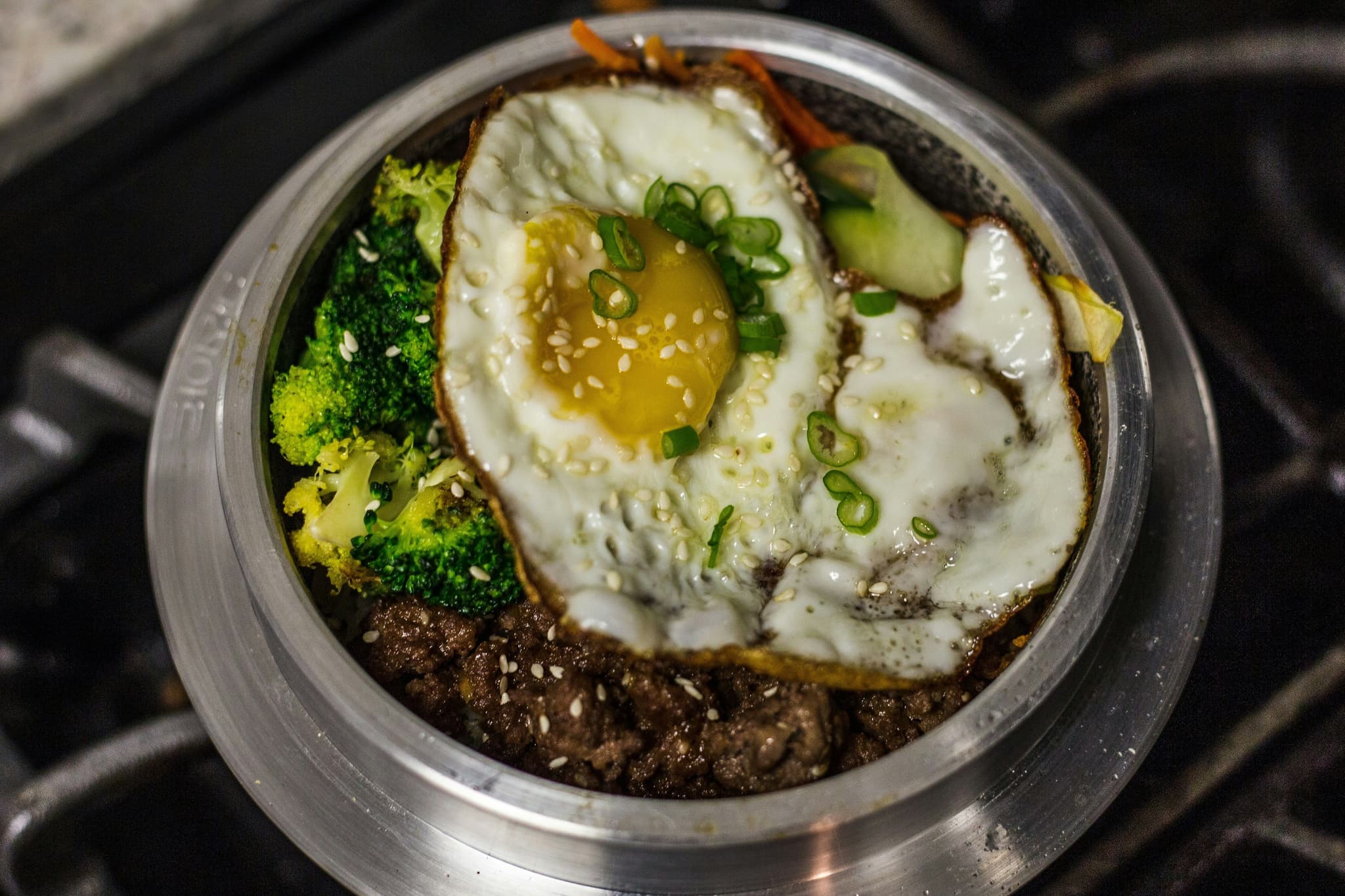 Traditional bibimbap bowl with vegetables and egg in Korea