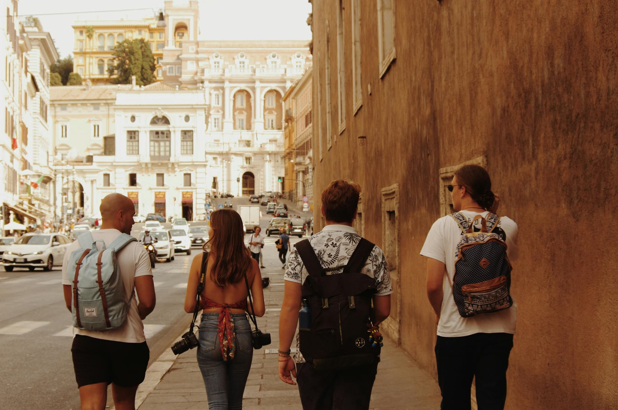 walking down a street with friends