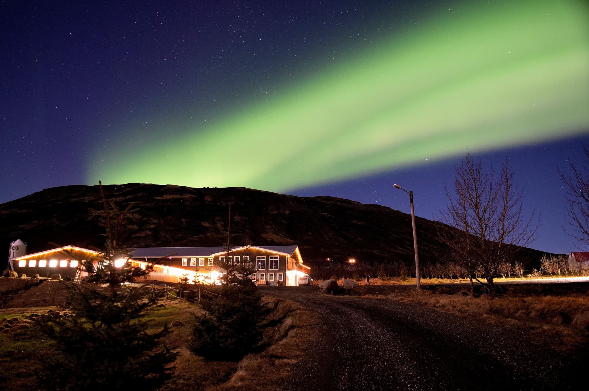 Northern lights reflected over hill in Iceland