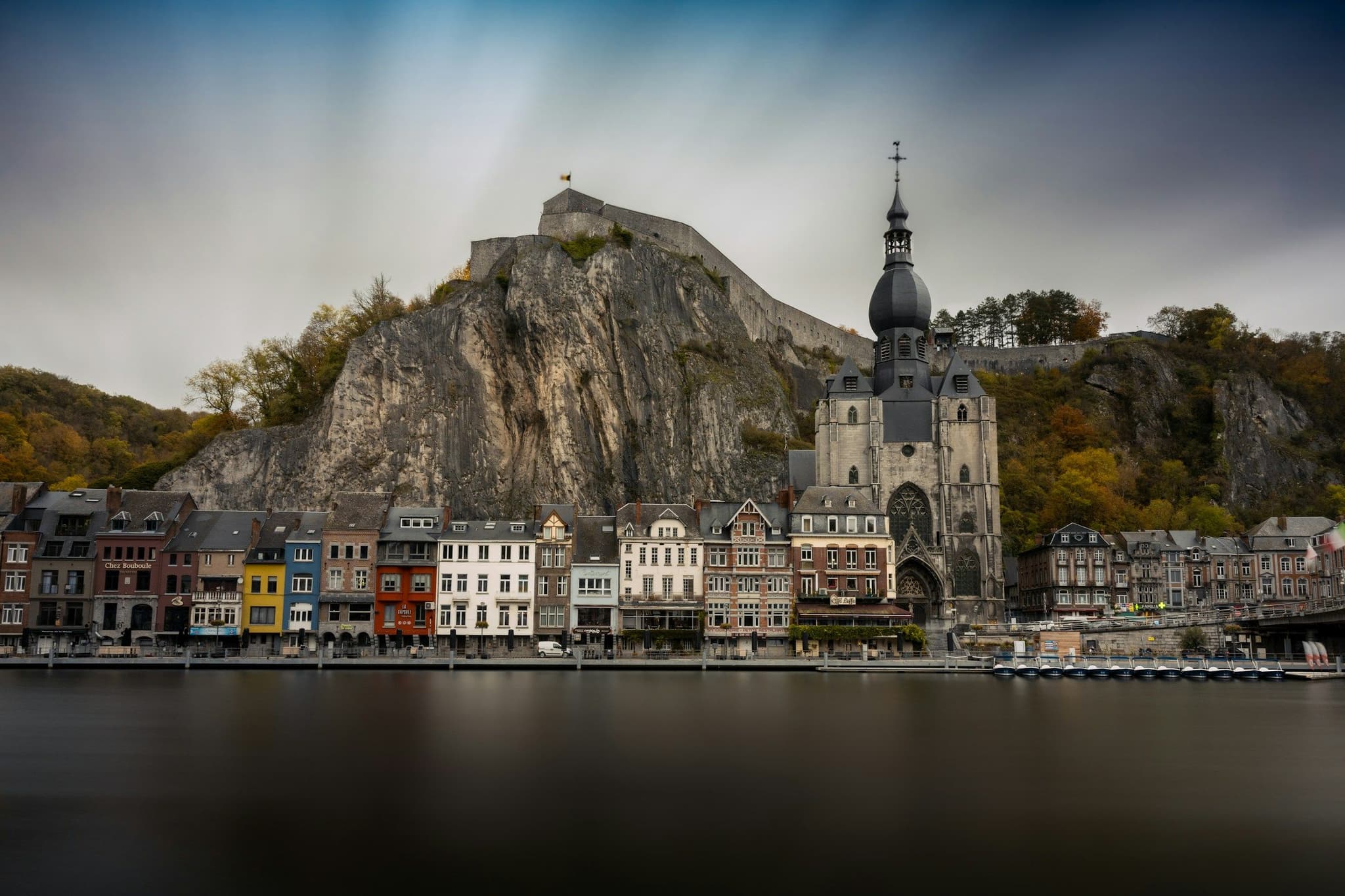 Dinant's riverside buildings on the Meuse below the cliffs