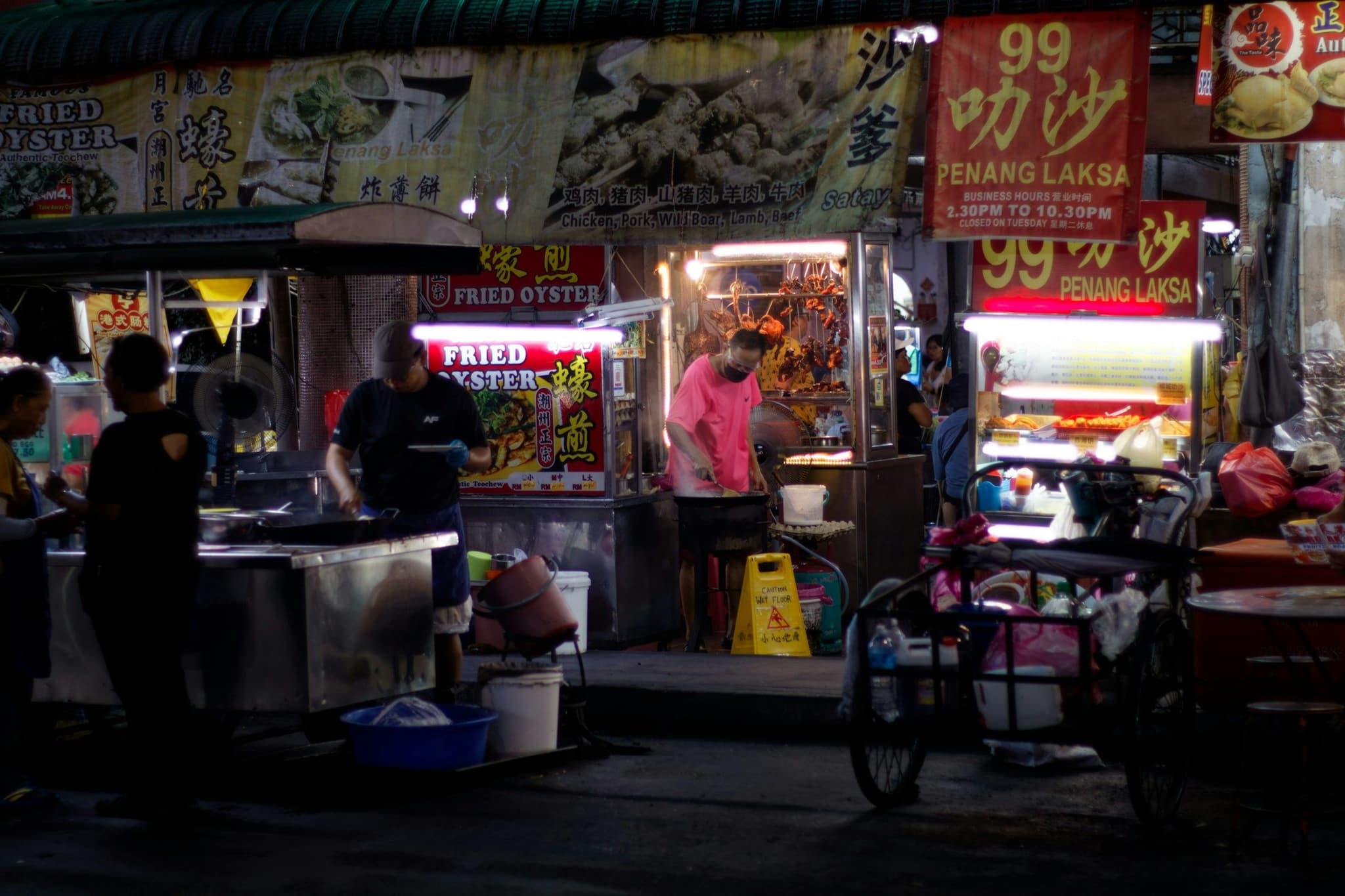 Busy hawker stalls lit up at night