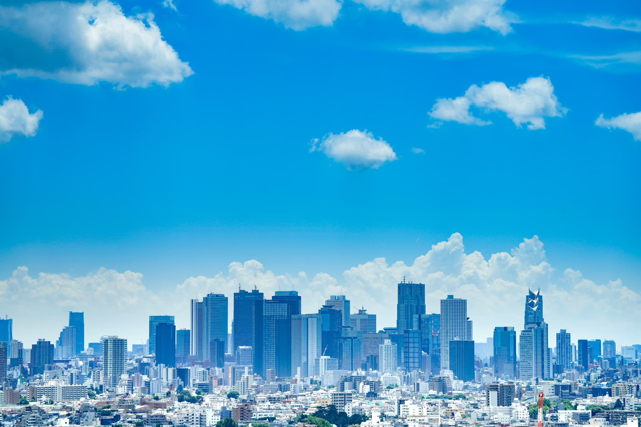 The city of tokyo from above on a clear day with blue sky