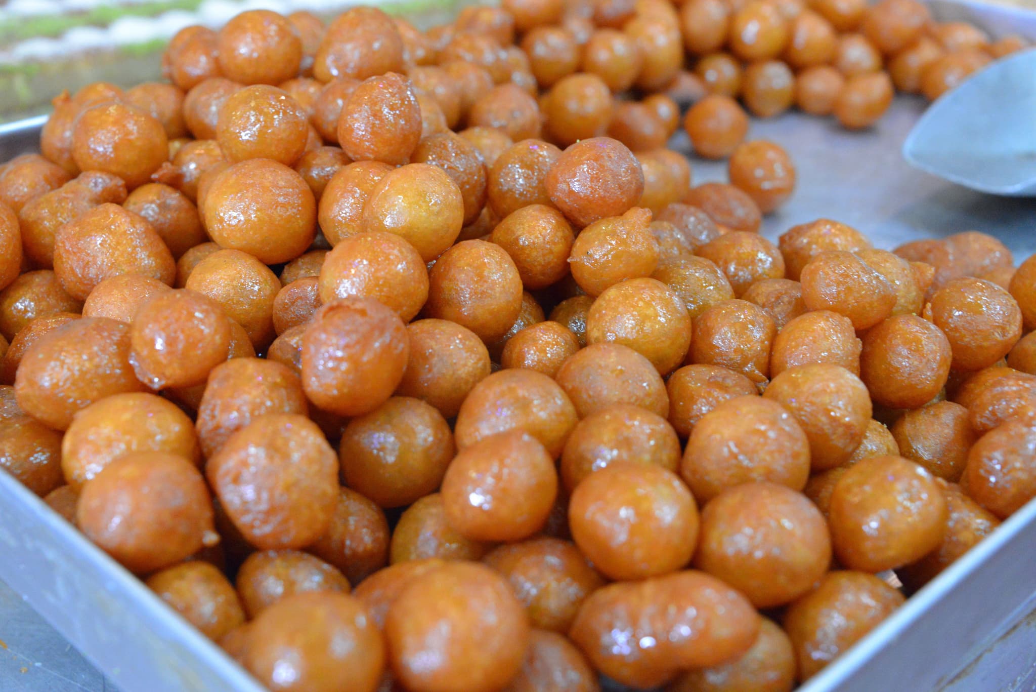 Loukoumades balls of dough on a stray