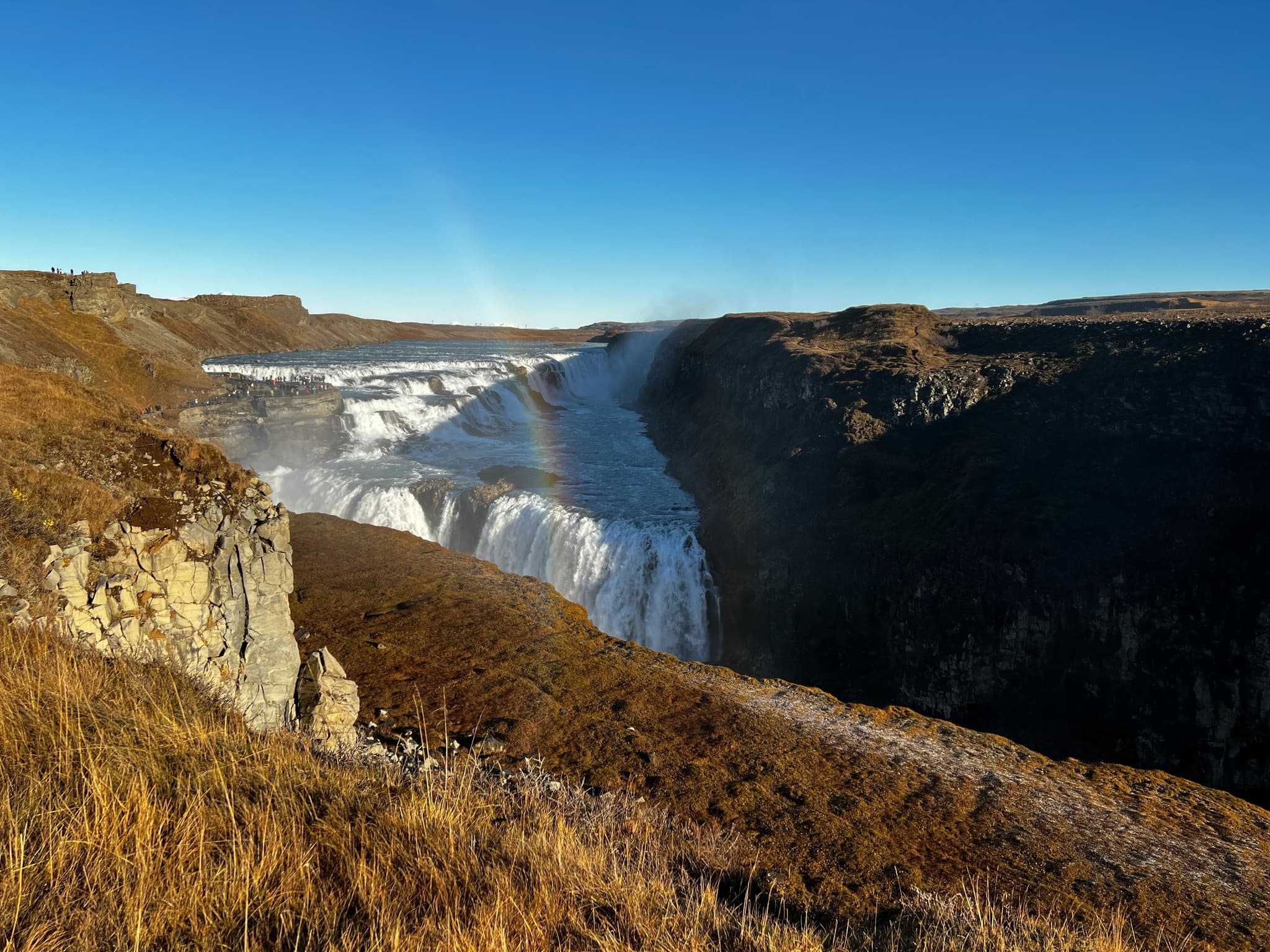 Gullfoss waterfall cascading in two tiers through a canyon on Iceland's Golden Circle