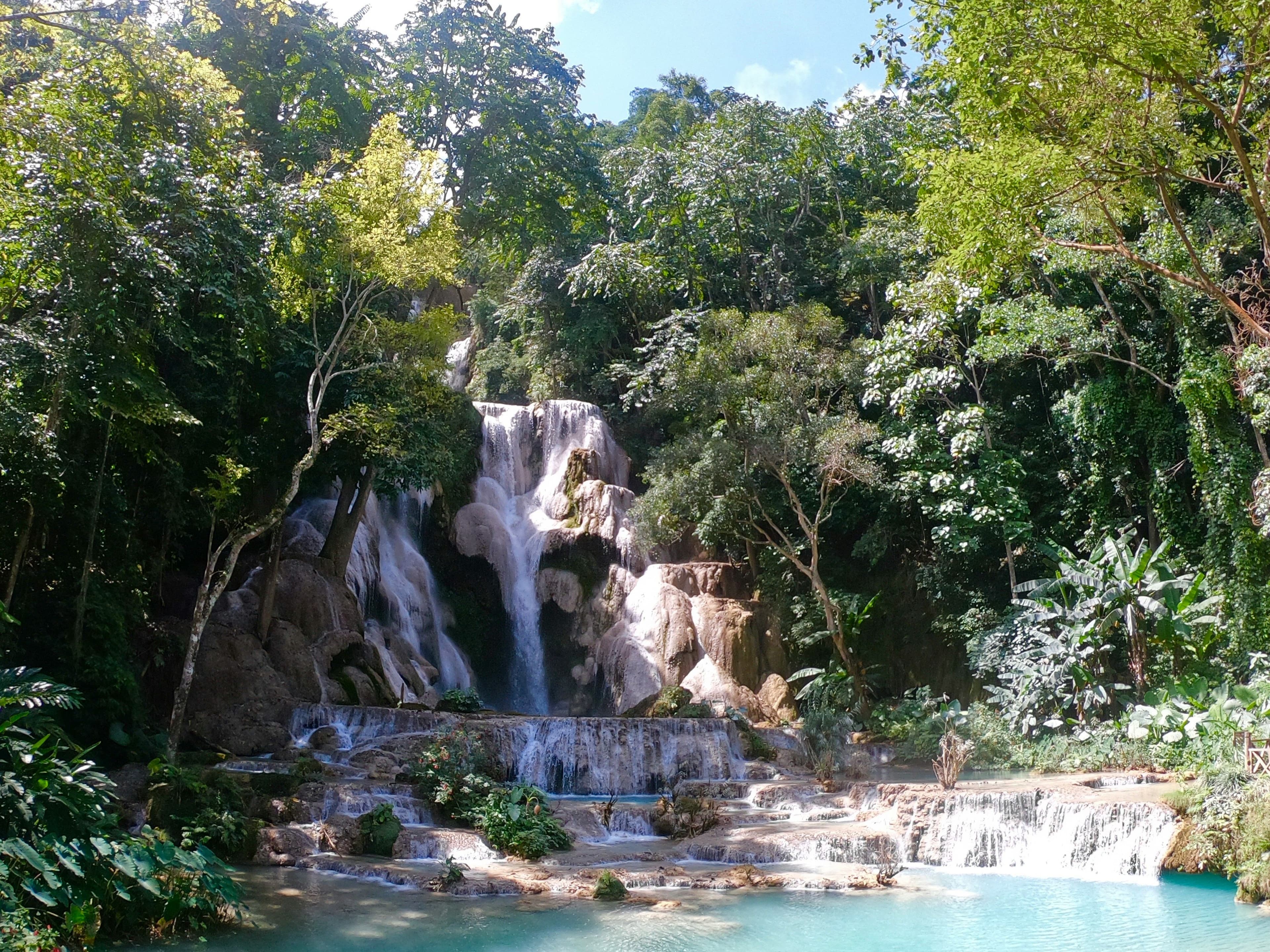 Kuang Si waterfalls surrounded by trees